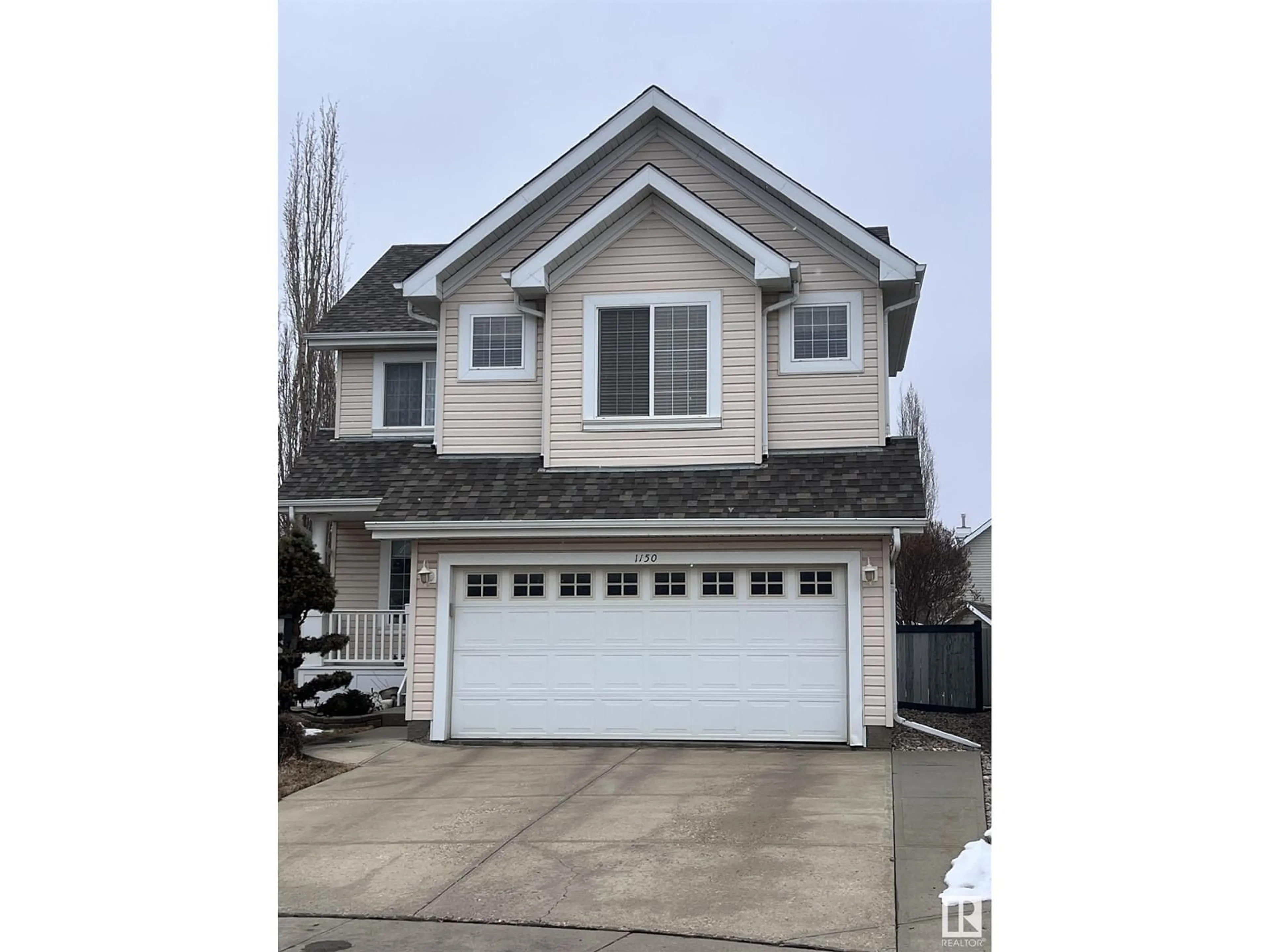 Home with vinyl exterior material, street for 1150 SUMMERSIDE DR SW, Edmonton Alberta T6X1C6