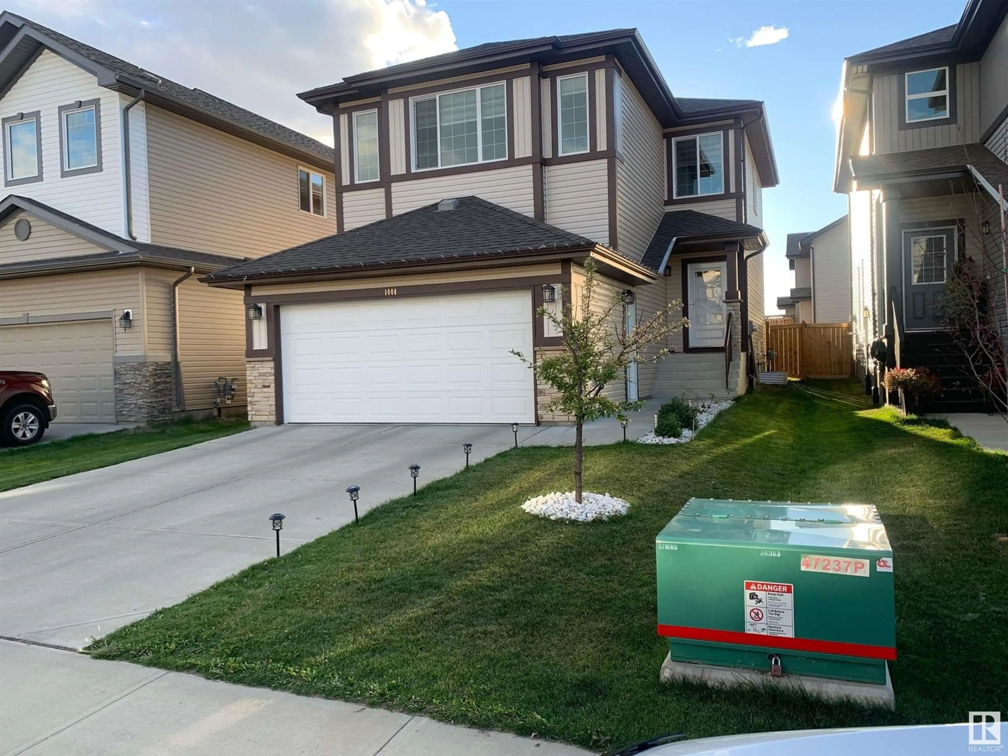 Home with vinyl exterior material, street for 1444 30 ST, Edmonton Alberta T6T0Z5