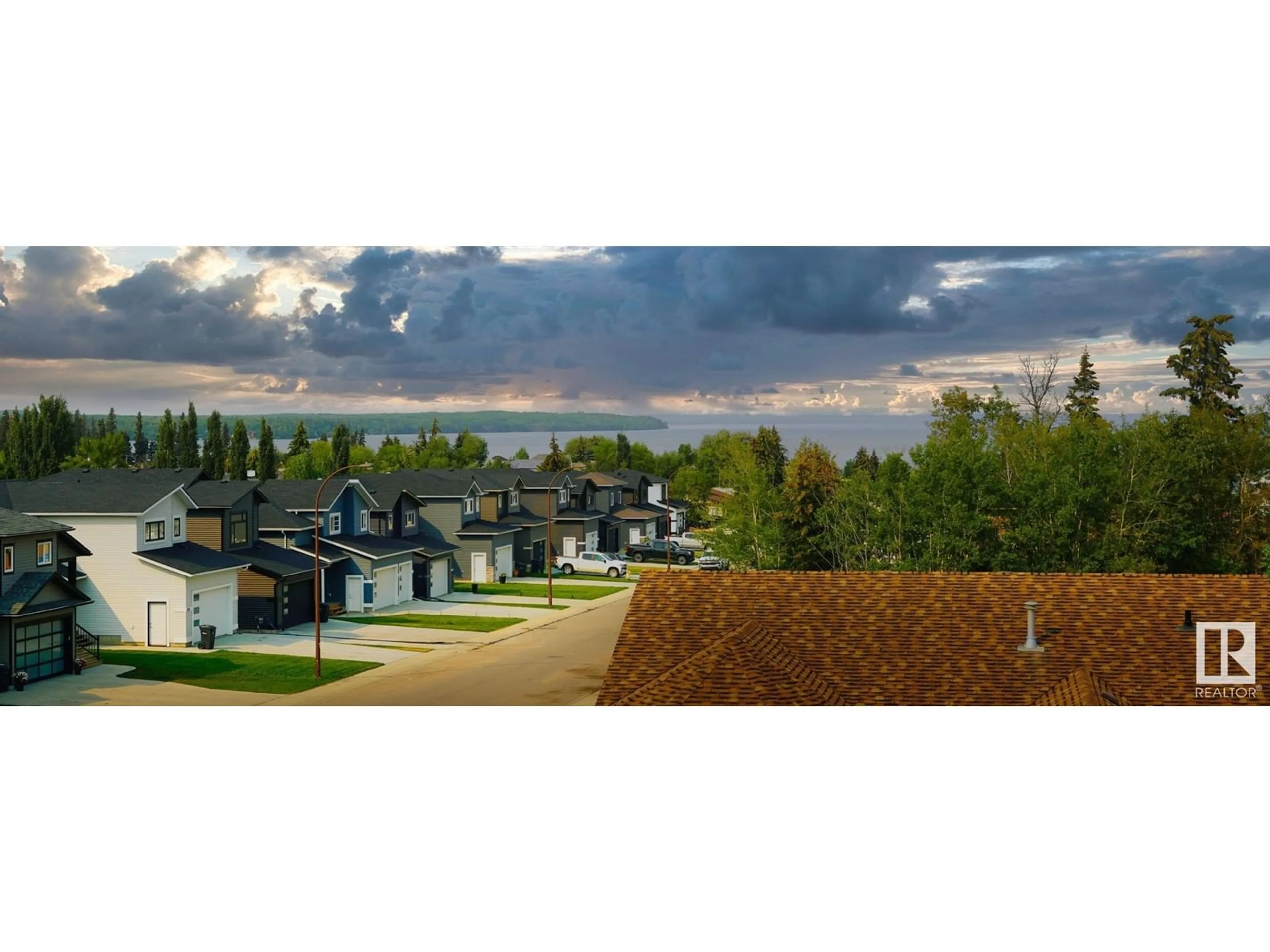 A pic from outside/outdoor area/front of a property/back of a property/a pic from drone, mountain view for #302 - 1705 7 AV, Cold Lake Alberta T9M0A6