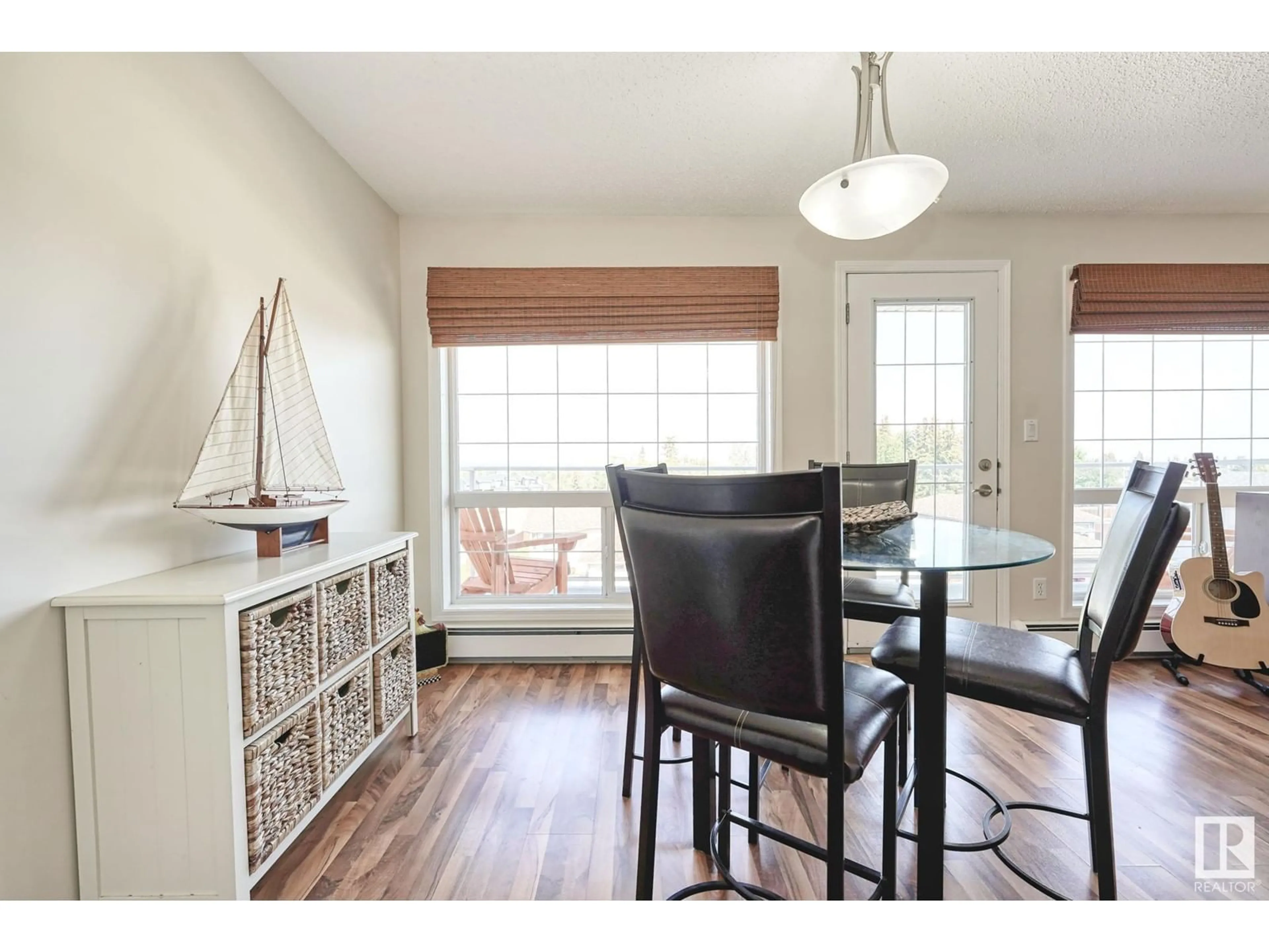 Dining room, wood/laminate floor for #302 - 1705 7 AV, Cold Lake Alberta T9M0A6