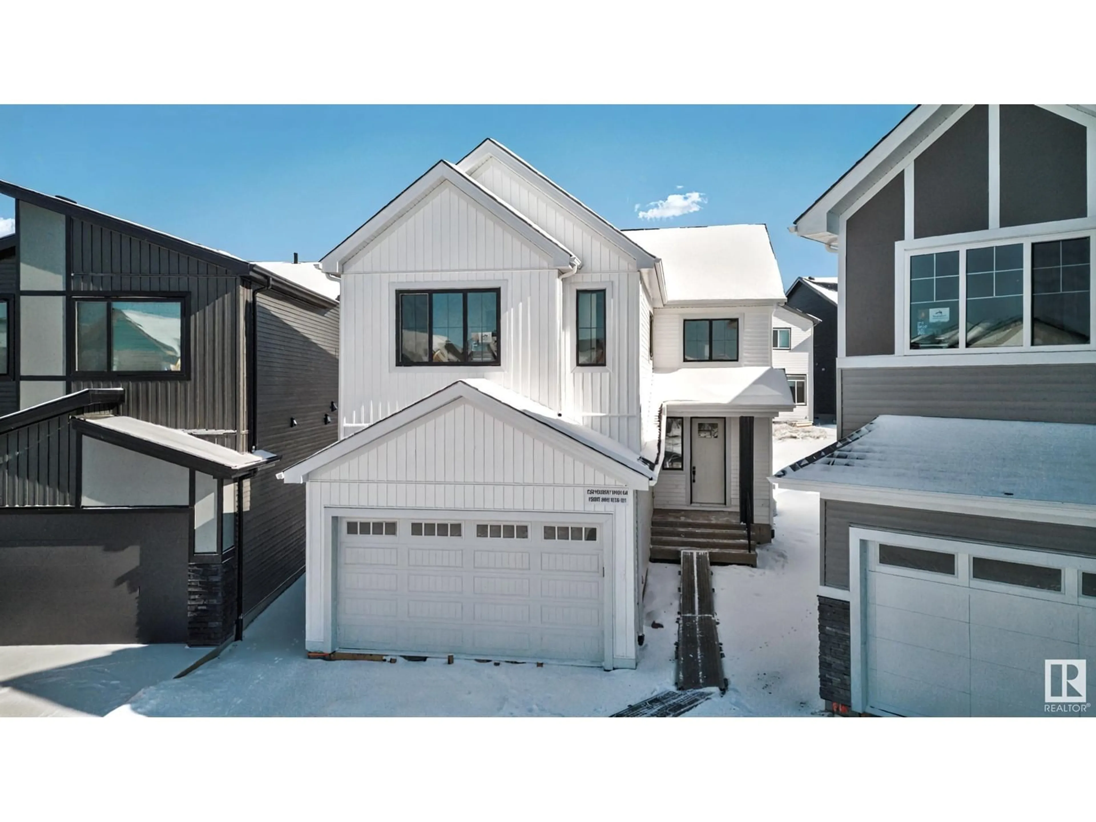 Home with vinyl exterior material, street for SW - 1295 PODERSKY WD, Edmonton Alberta T6W5E4