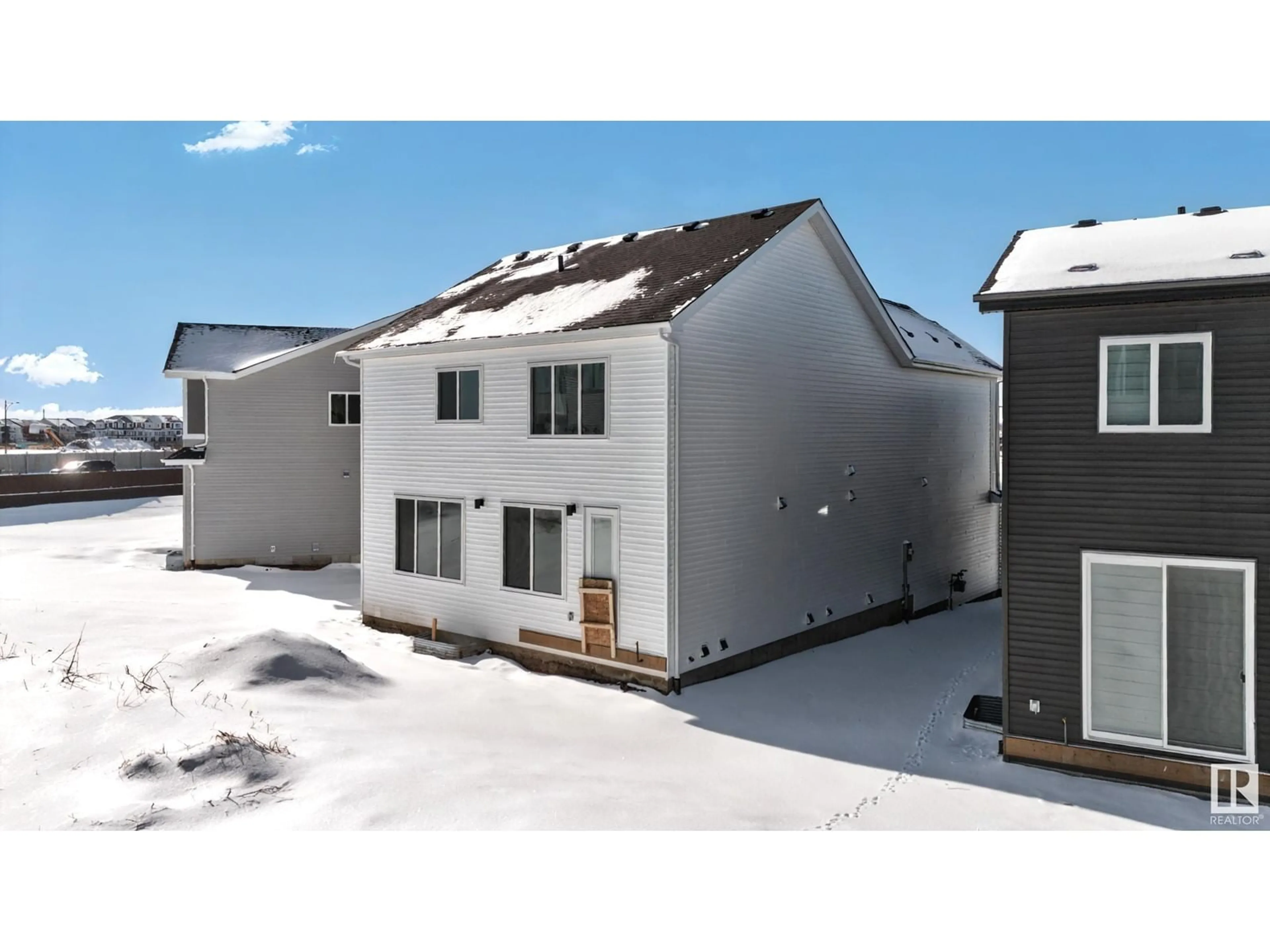 A pic from outside/outdoor area/front of a property/back of a property/a pic from drone, building for SW - 1295 PODERSKY WD, Edmonton Alberta T6W5E4