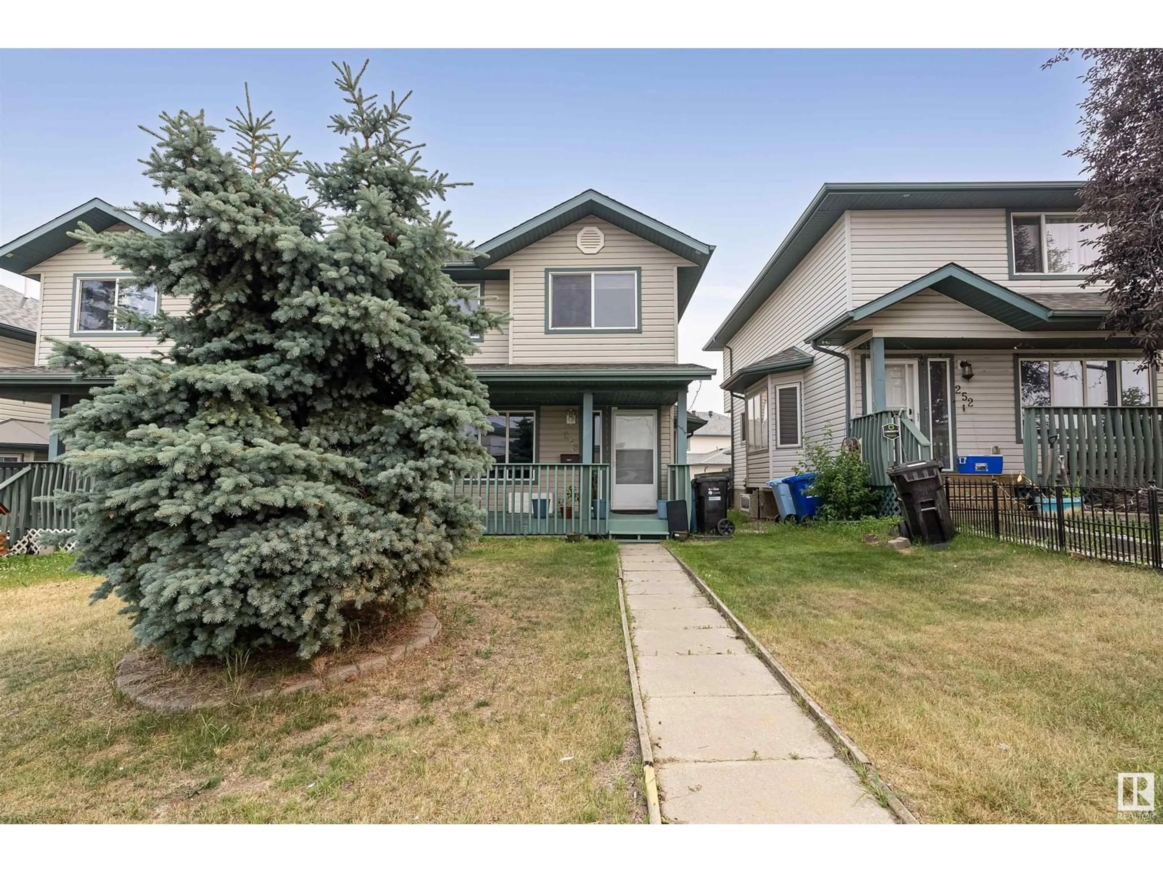 Home with vinyl exterior material, street for 248 SITKA DR, Fort McMurray Alberta T9H5C9