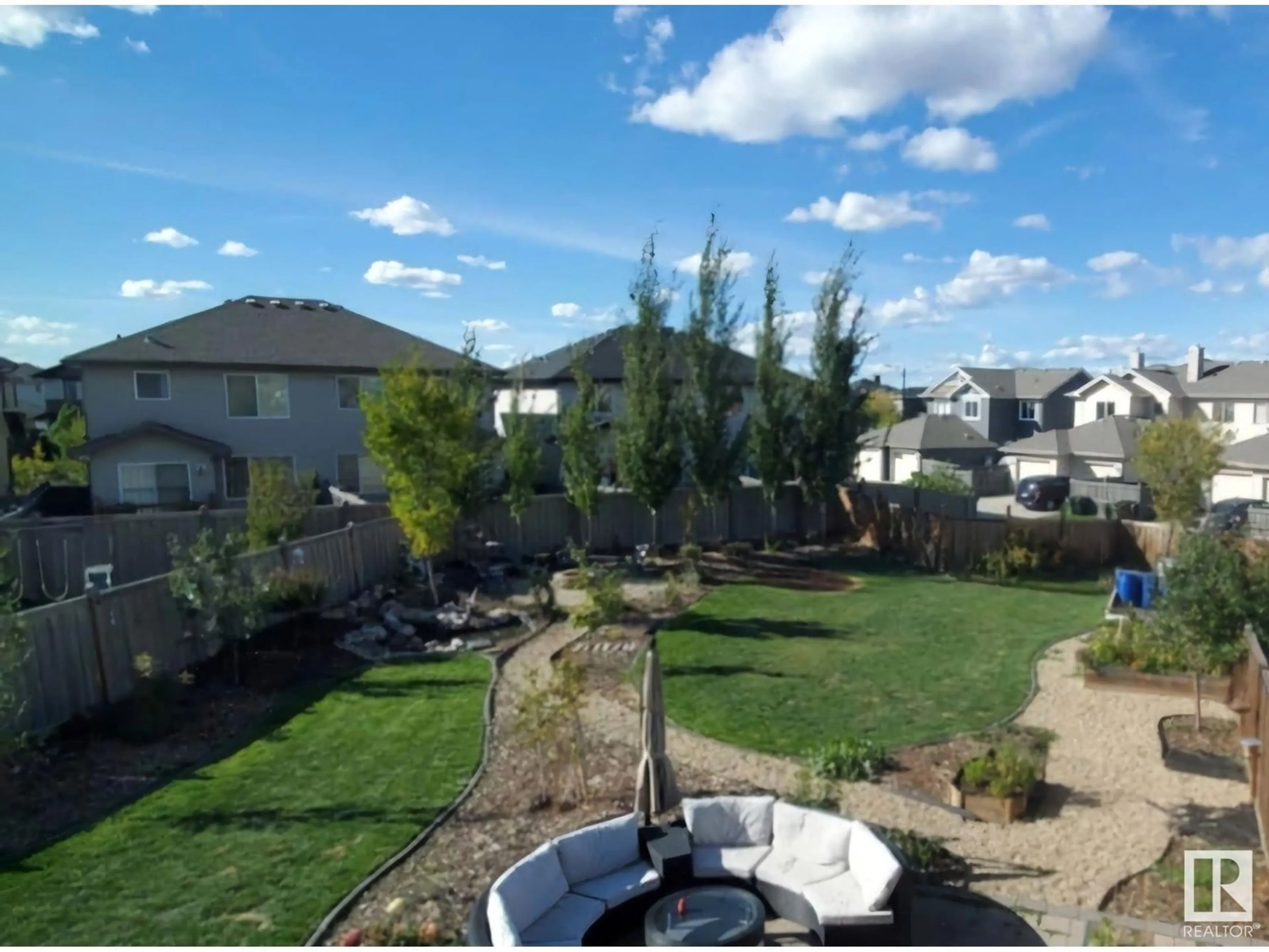 A pic from outside/outdoor area/front of a property/back of a property/a pic from drone, water/lake/river/ocean view for 1106 176 ST SW, Edmonton Alberta T6W2B7