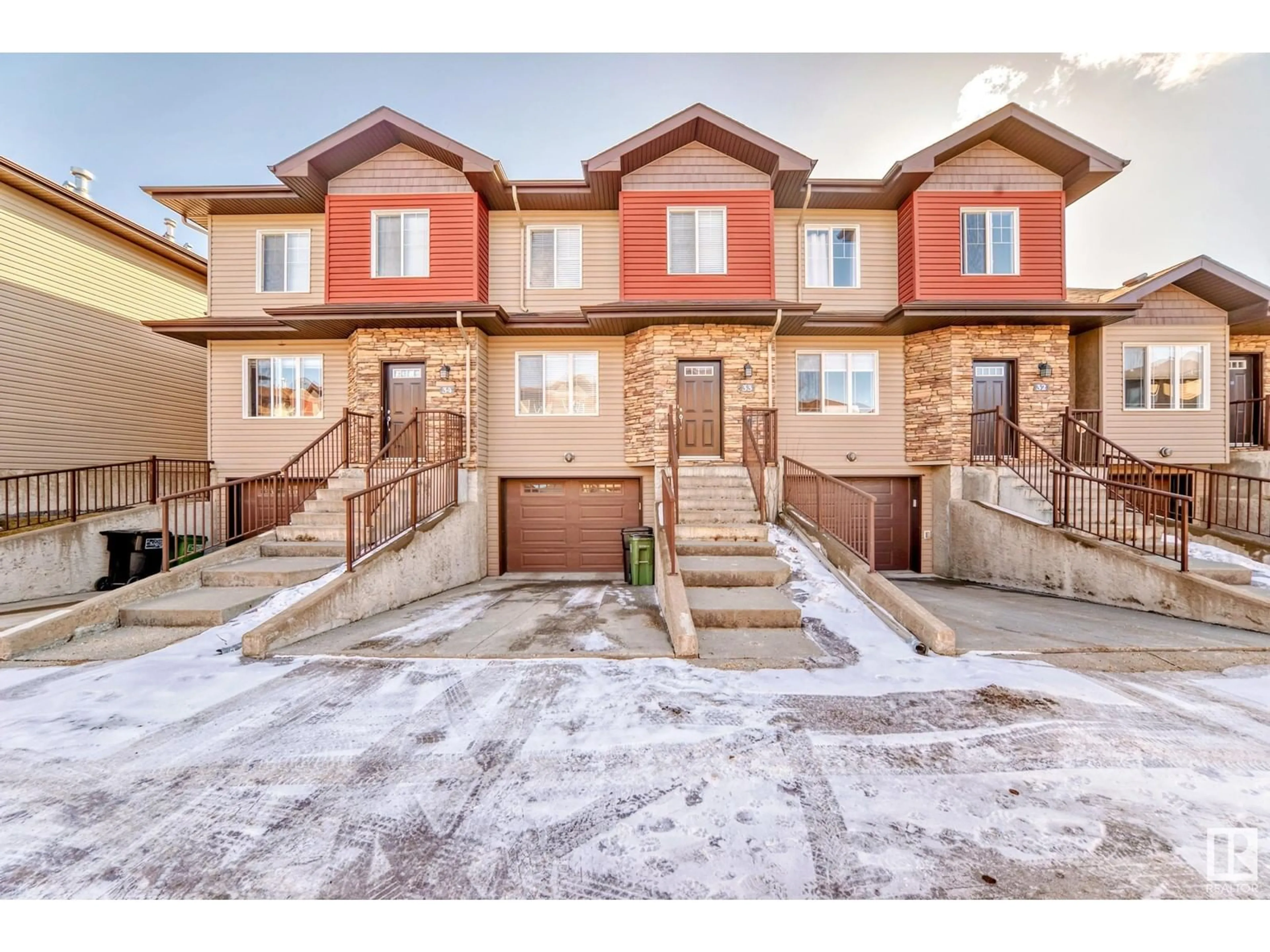 Home with brick exterior material, street for #33 12930 140 AV NW, Edmonton Alberta T6V0C4