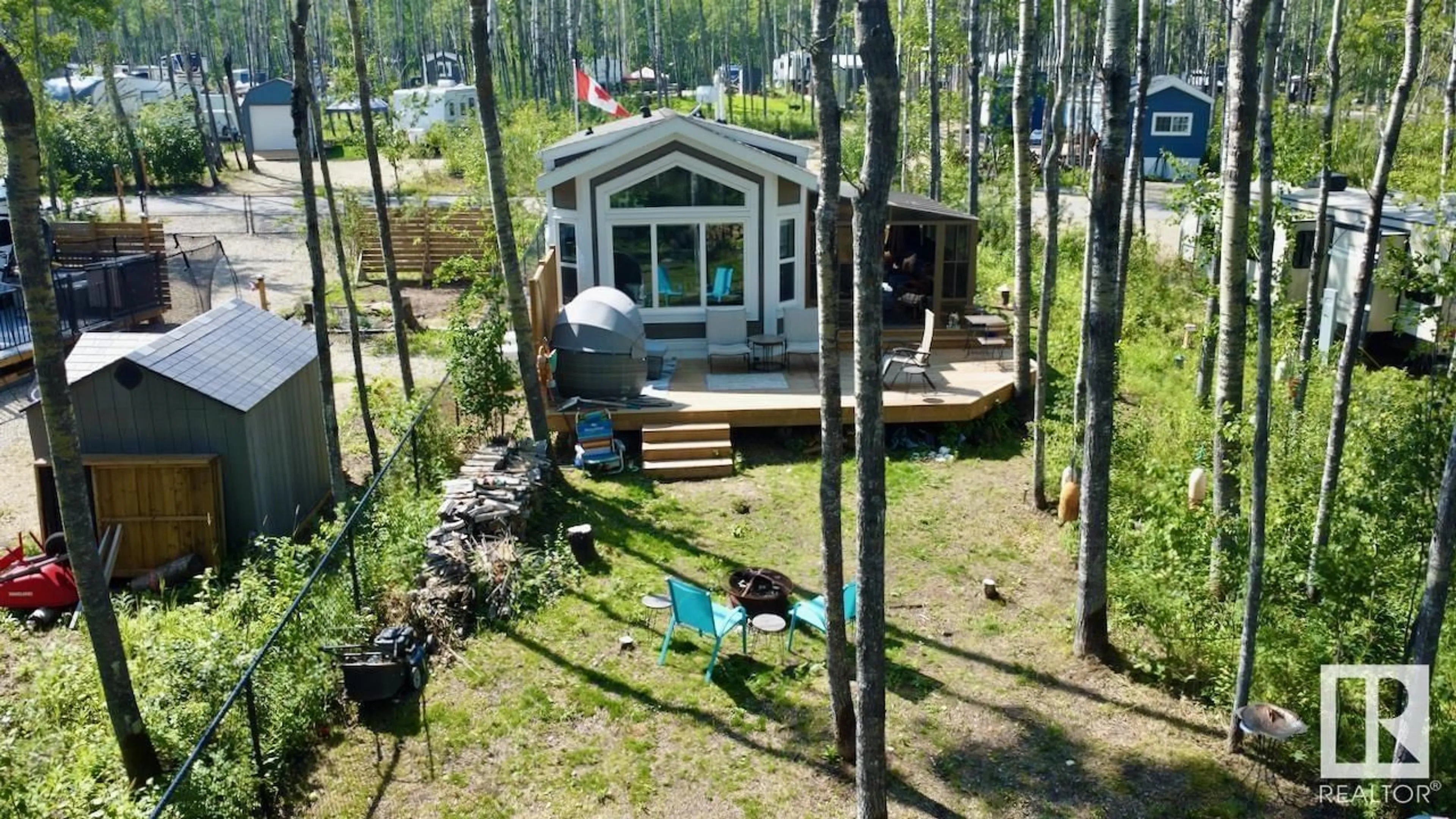 A pic from outside/outdoor area/front of a property/back of a property/a pic from drone, forest/trees view for 53509 RGE RD 60, Rural Parkland County Alberta T0E2B0