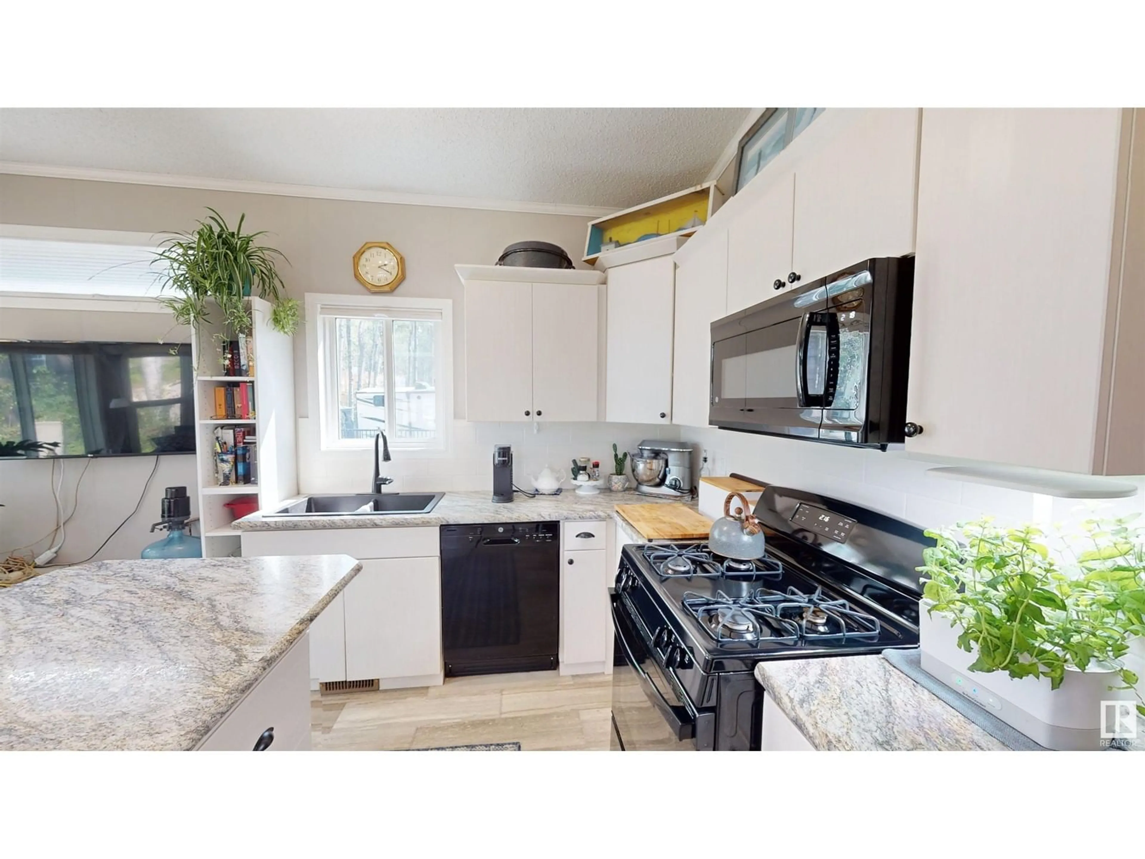 Open concept kitchen, ceramic/tile floor for 53509 RGE RD 60, Rural Parkland County Alberta T0E2B0