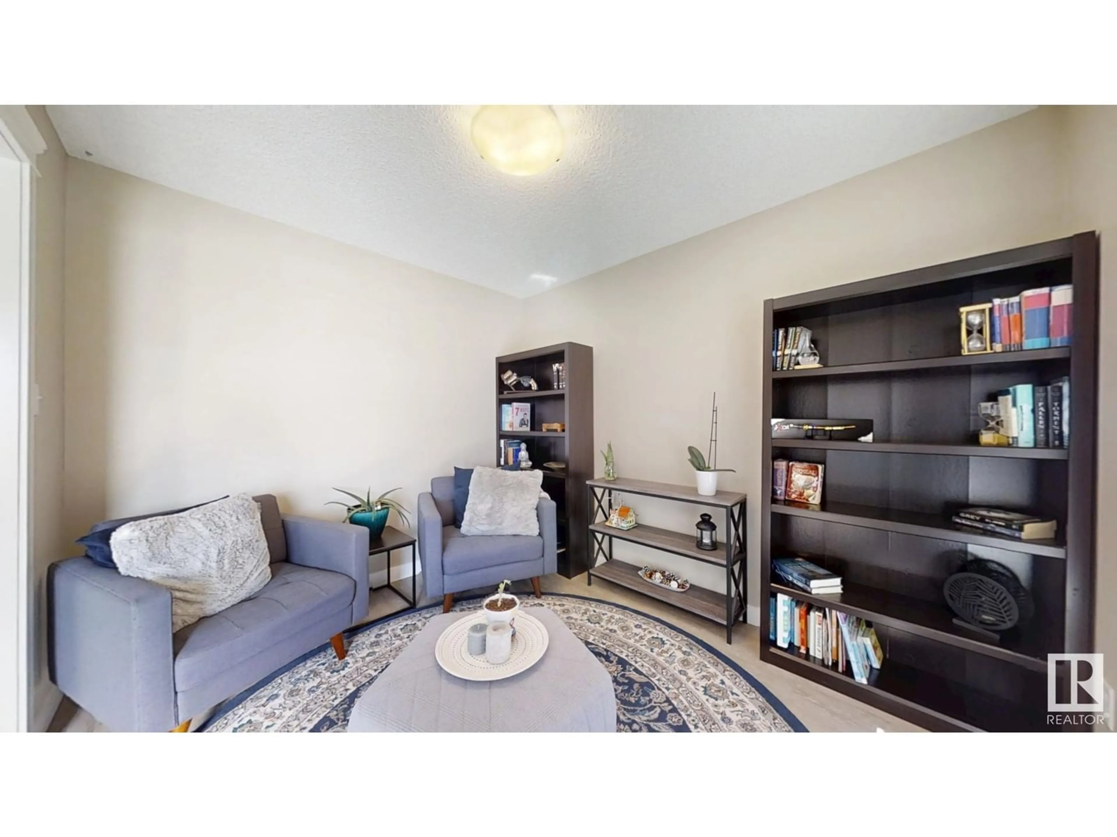 Living room with furniture, unknown for 5112 22 AV, Edmonton Alberta T6X2H7