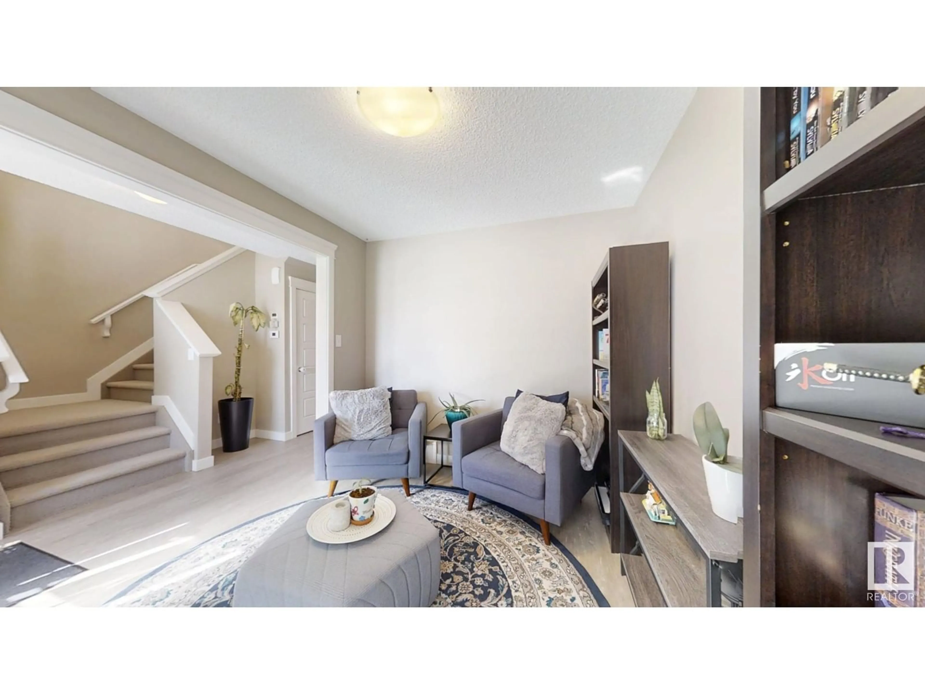 Living room with furniture, unknown for 5112 22 AV, Edmonton Alberta T6X2H7