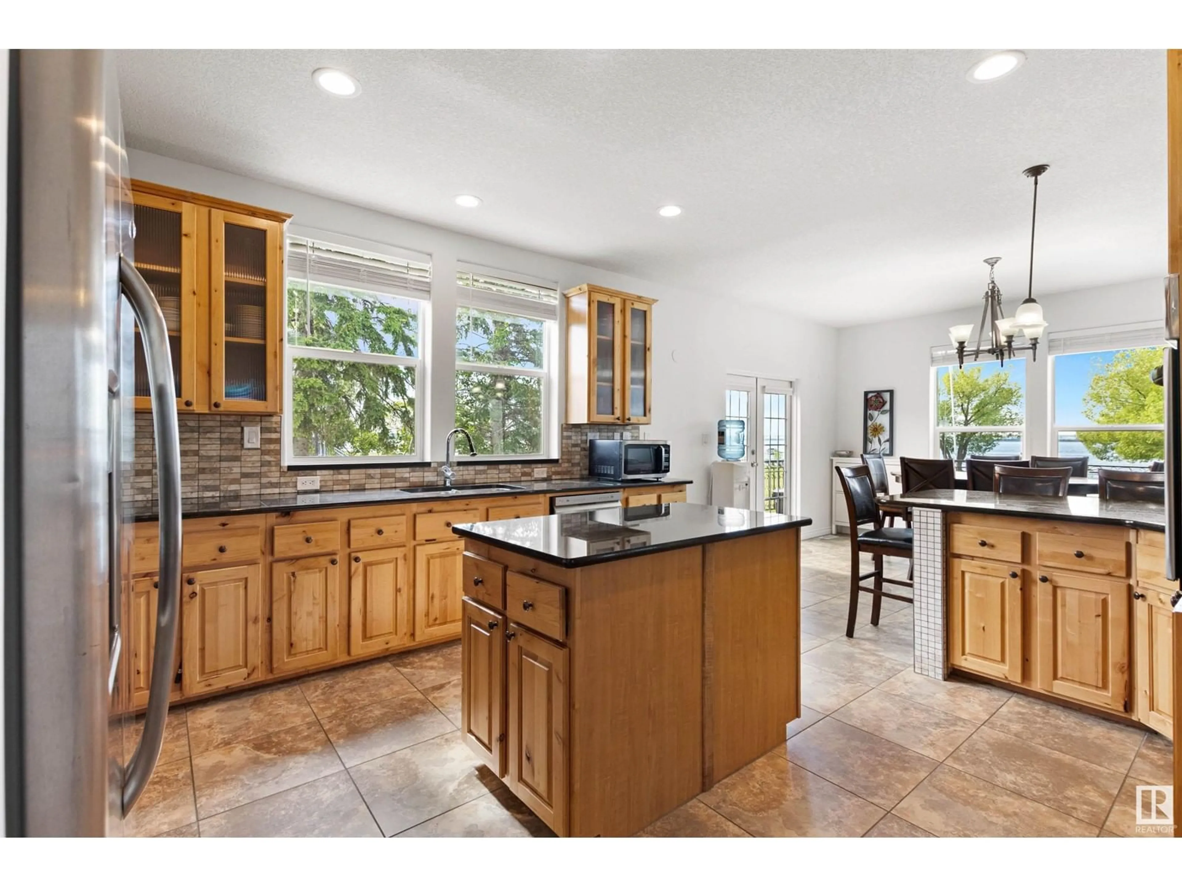 Open concept kitchen, ceramic/tile floor for 19 RIZZIE BEACH, Rural Parkland County Alberta T0E2K0