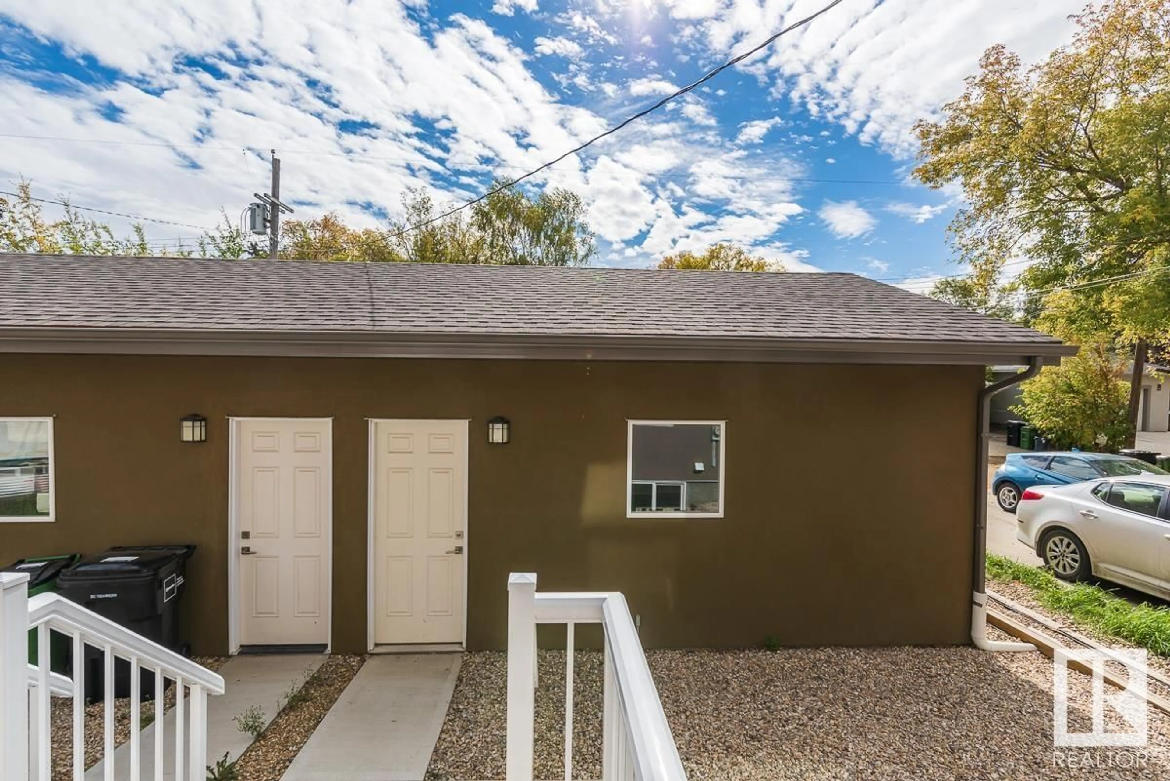 Home with vinyl exterior material, street for 11429 80 AV, Edmonton Alberta T6G0R6