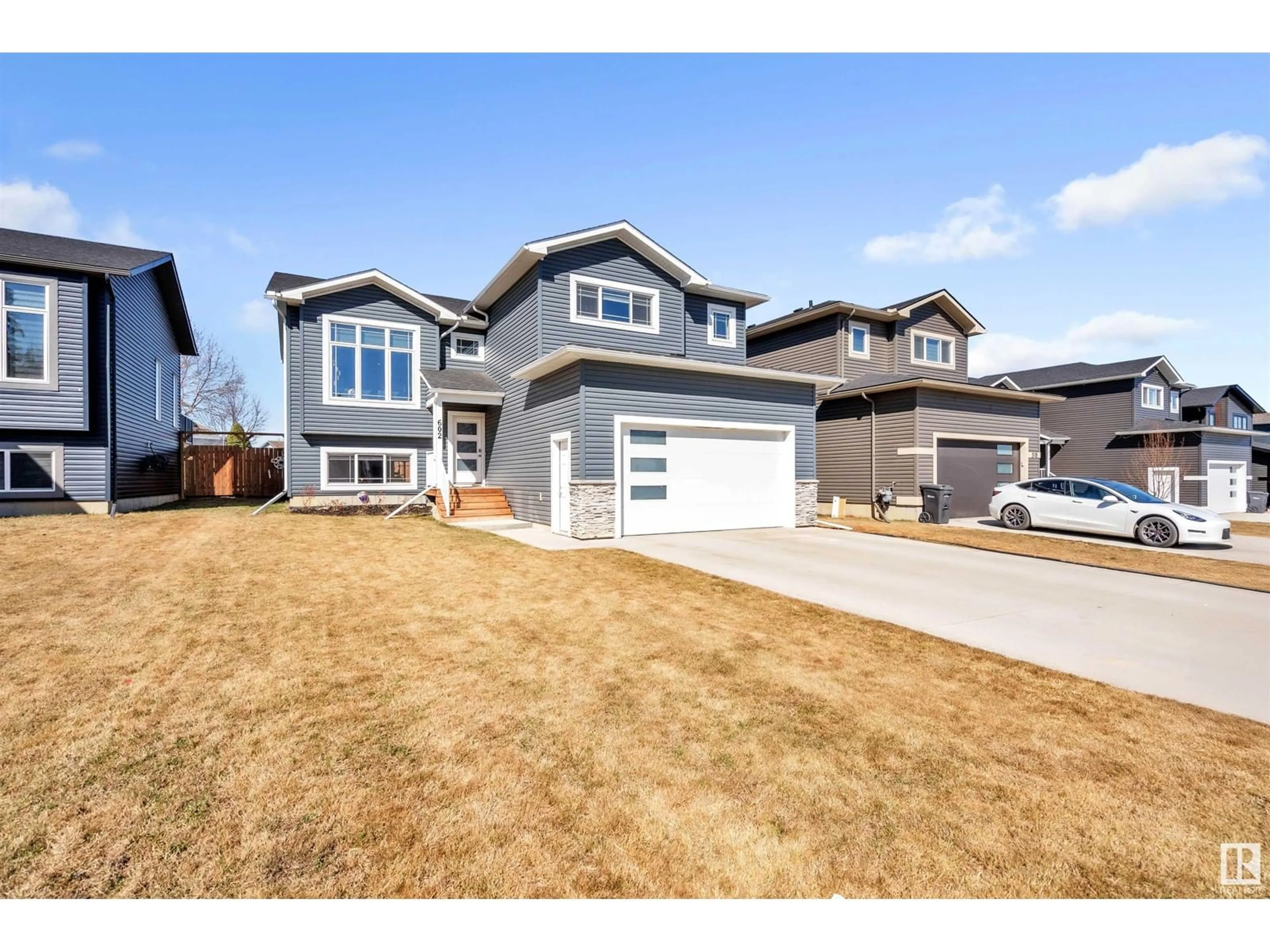Home with vinyl exterior material, street for 602 18 ST, Cold Lake Alberta T9M0K3
