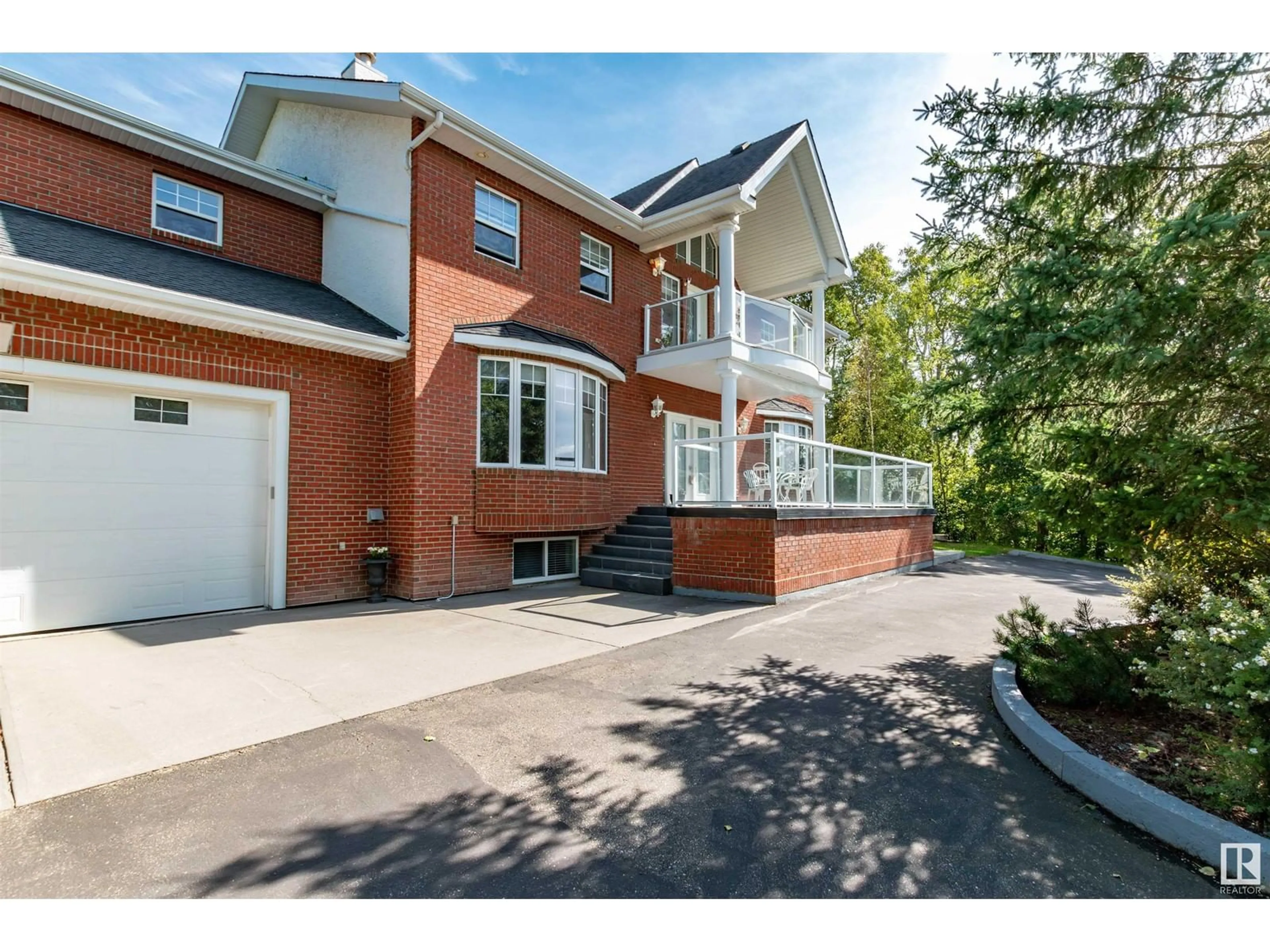 Home with brick exterior material, street for 338 - 52147 RGE RD 231, Rural Strathcona County Alberta T8B1A4
