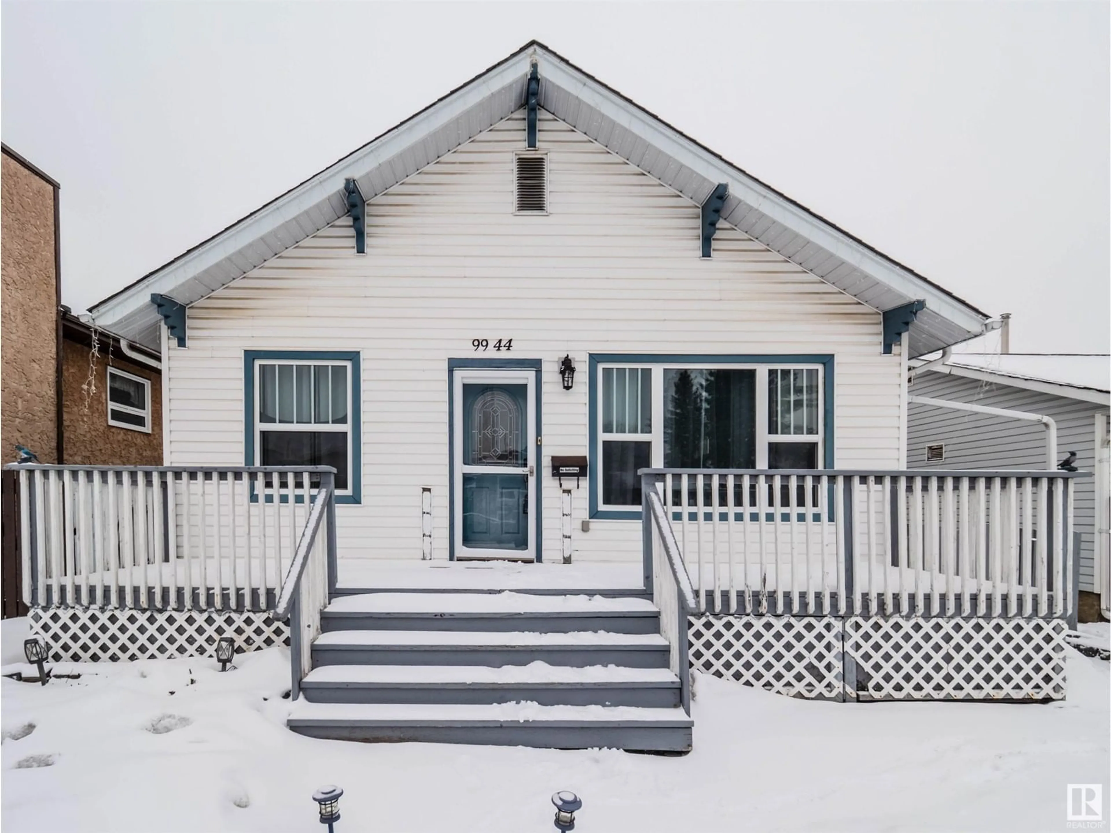 Home with vinyl exterior material, street for 9944 160 ST NW, Edmonton Alberta T5P3E4