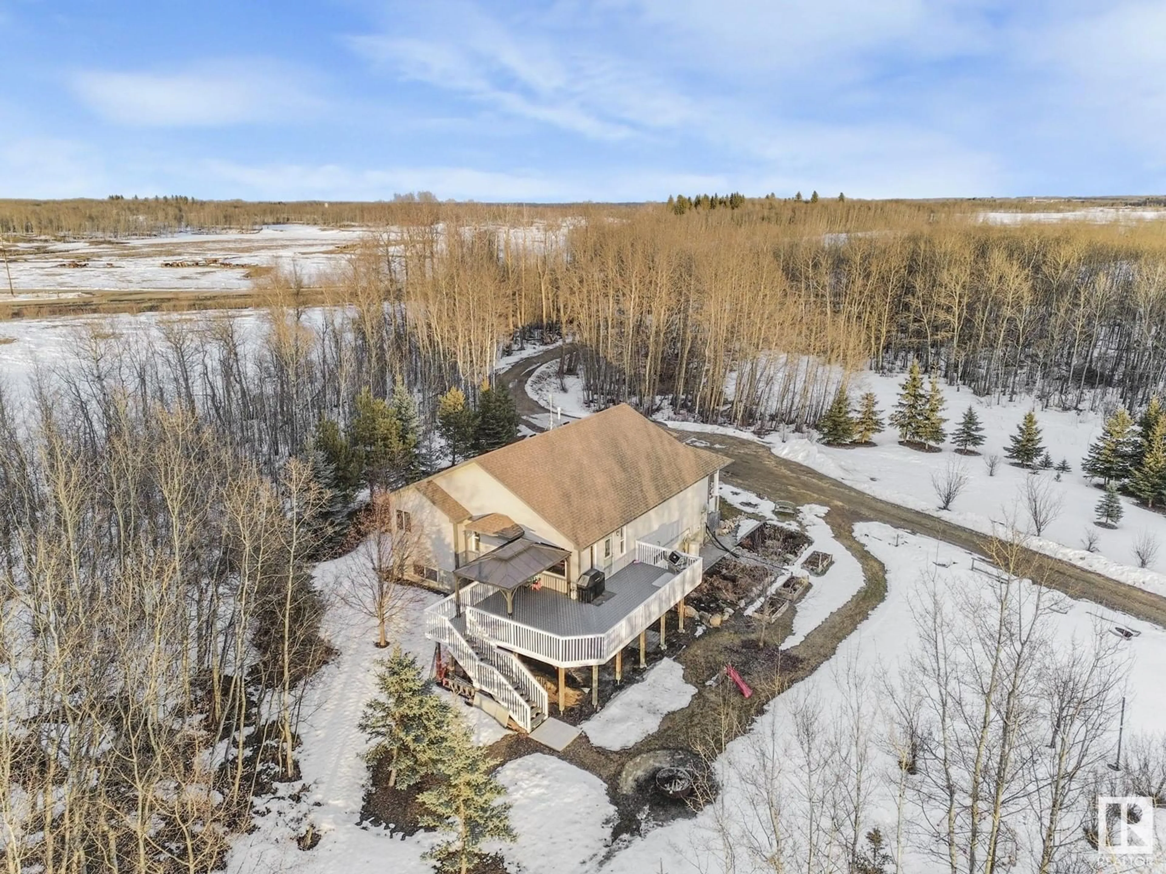 A pic from outside/outdoor area/front of a property/back of a property/a pic from drone, water/lake/river/ocean view for 50240 RGE RD 225, Rural Leduc County Alberta T0B3M1