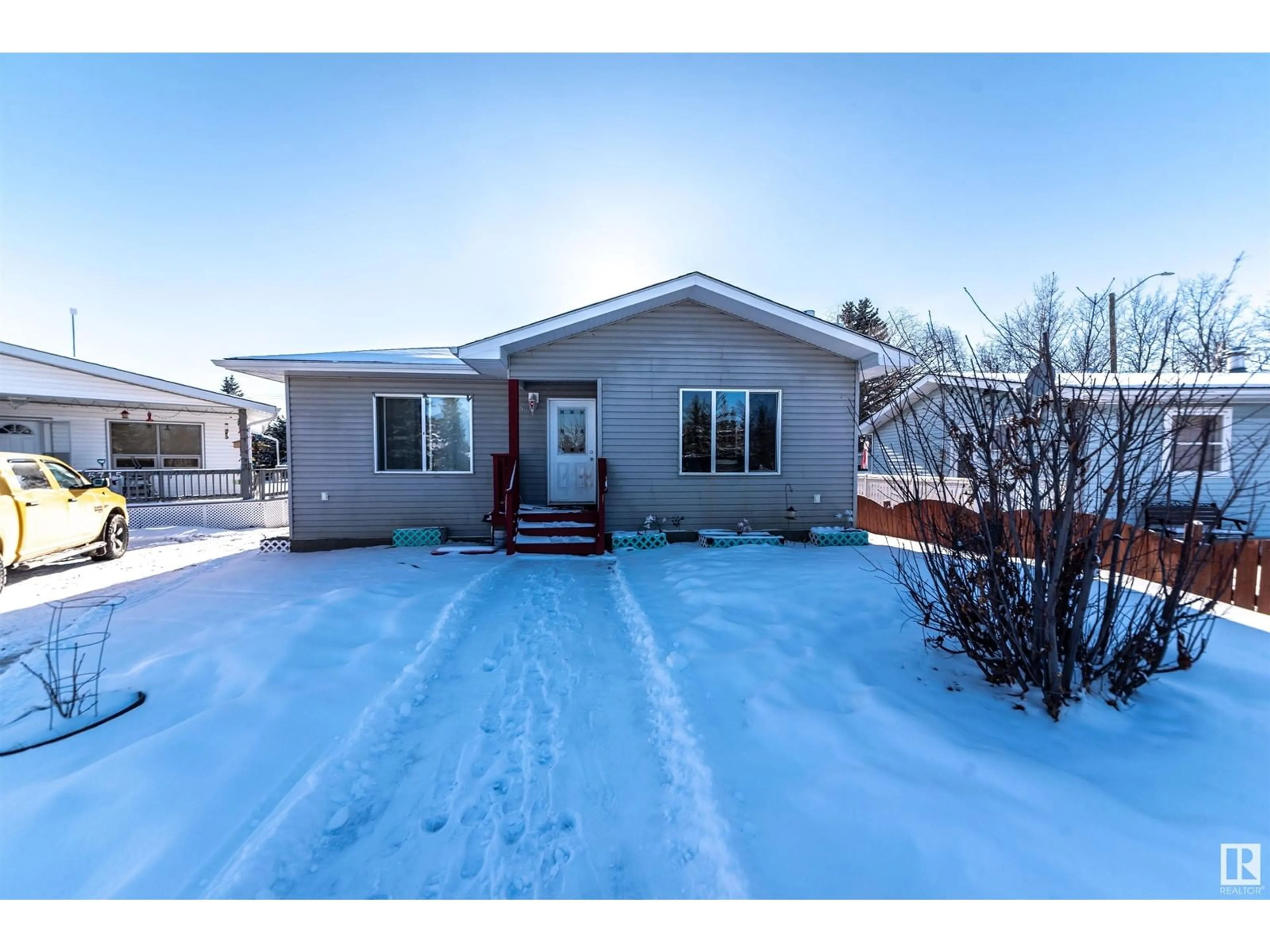 A pic from outside/outdoor area/front of a property/back of a property/a pic from drone, street for 5719 STE ANNE TR, Rural Lac Ste. Anne County Alberta T0E0A0