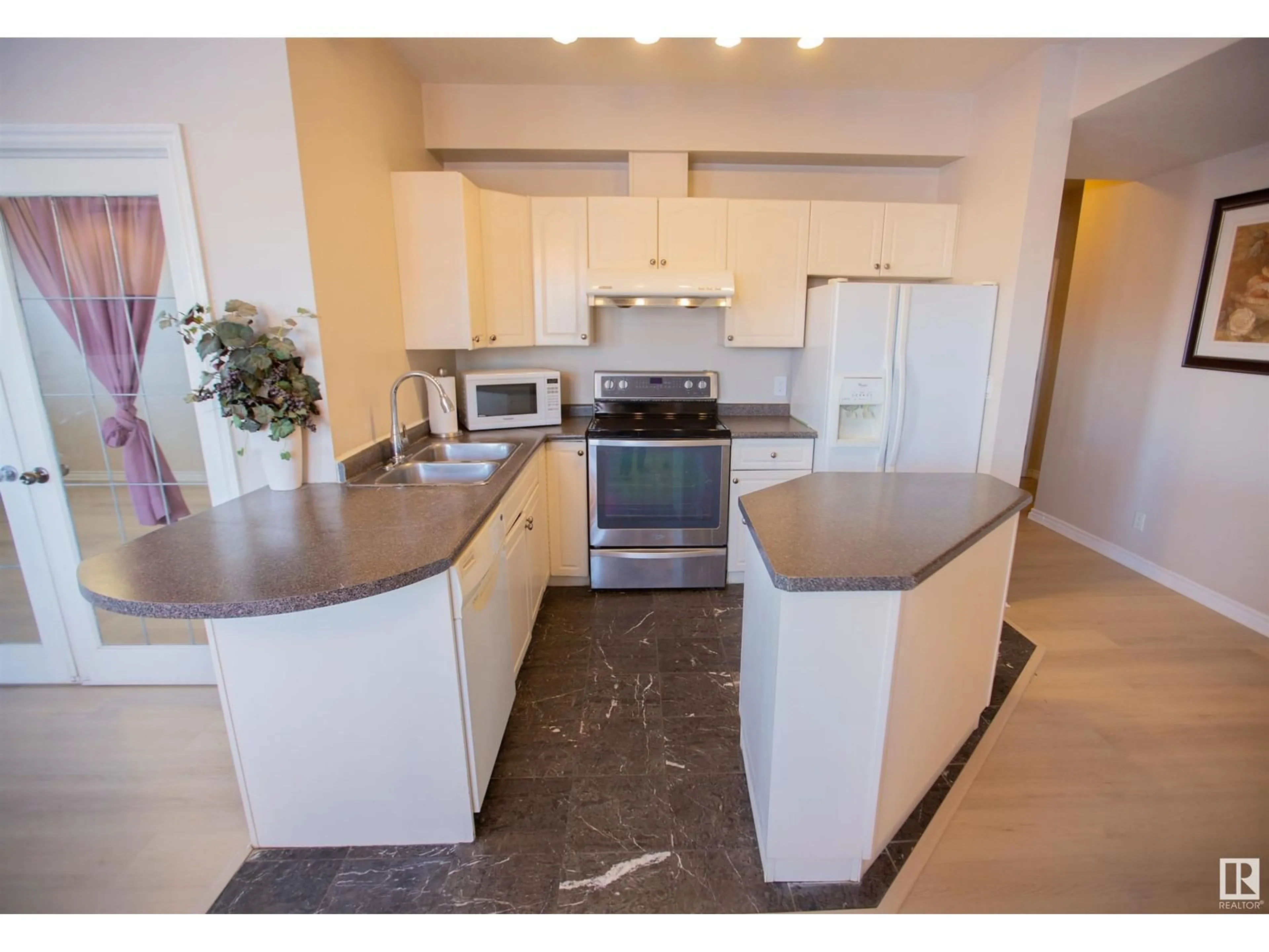 Open concept kitchen, unknown for #101 - 10346 117 ST, Edmonton Alberta T5K2Y7