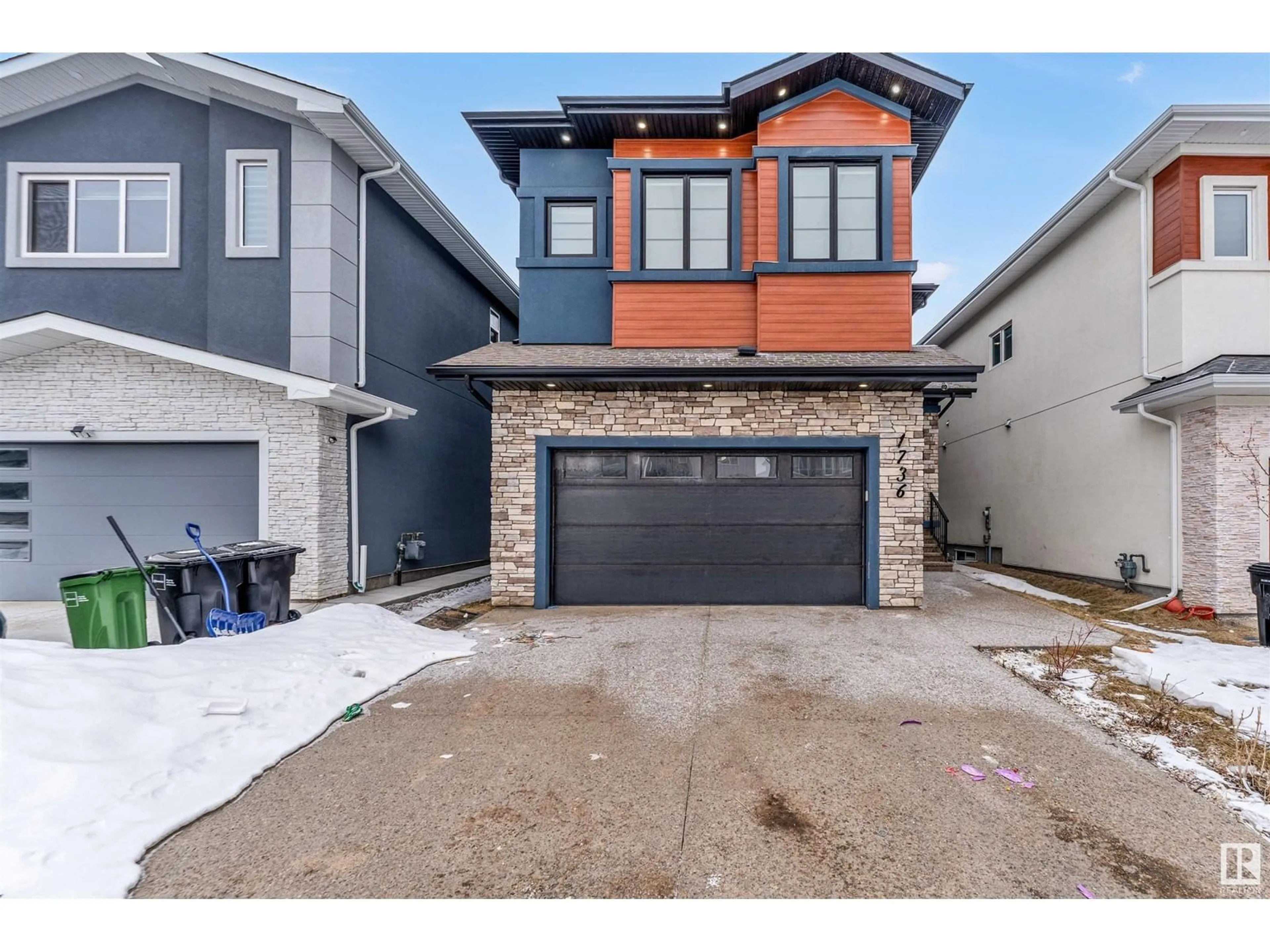 Home with brick exterior material, street for 1736 18 St. NW, Edmonton Alberta T6T2N2