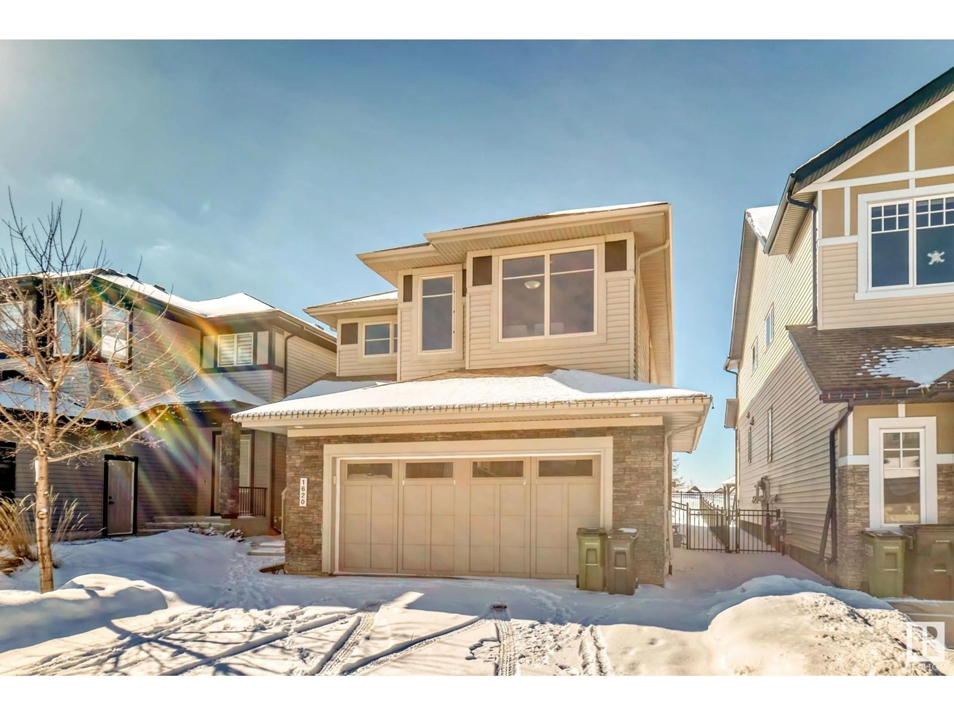 Home with vinyl exterior material, street for 1620 AINSLIE LN SW, Edmonton Alberta T6W0H5