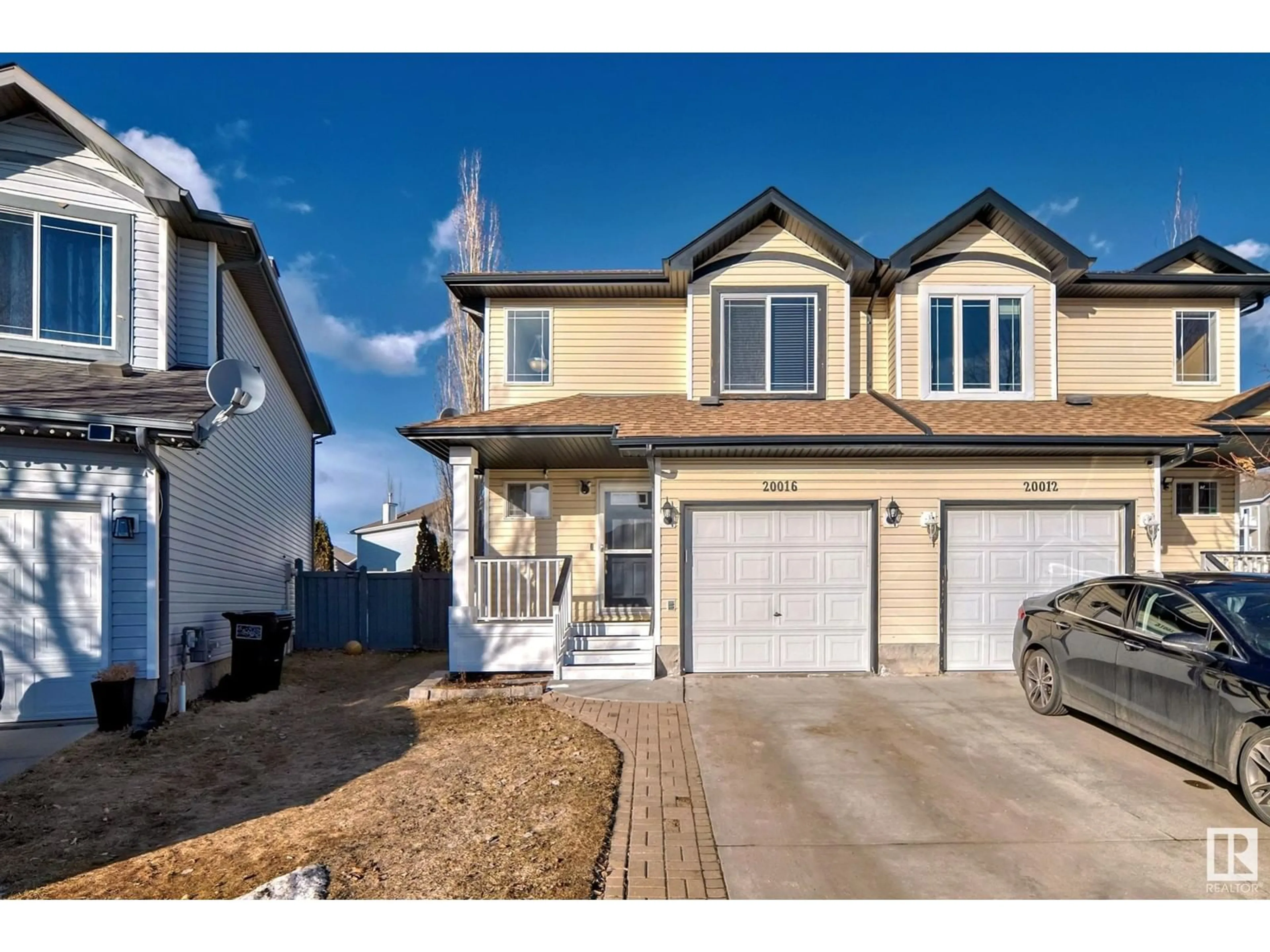 Home with vinyl exterior material, street for 20016 53A AV NW, Edmonton Alberta T6M2W2