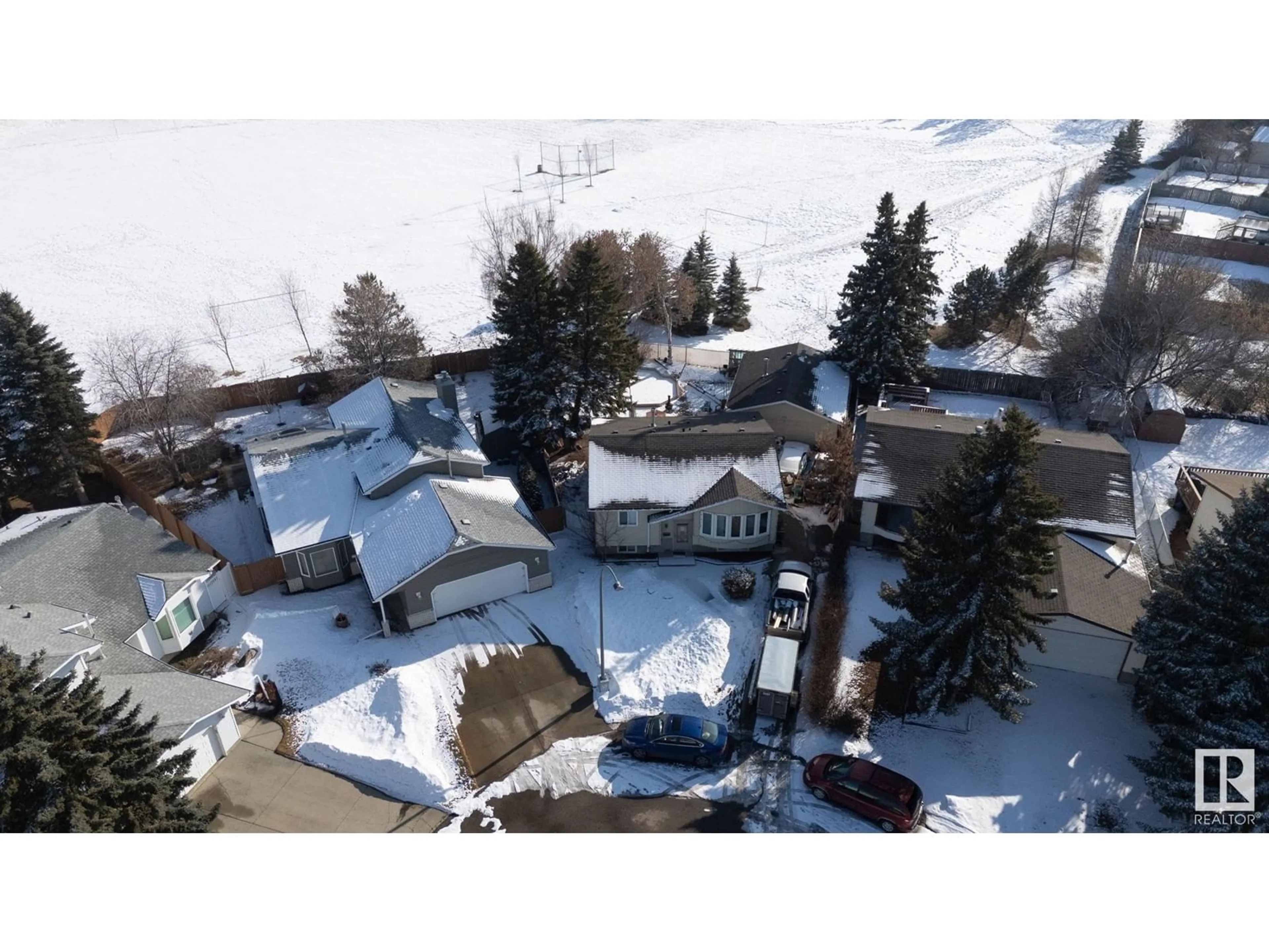 A pic from outside/outdoor area/front of a property/back of a property/a pic from drone, unknown for NW - 1851 40 ST, Edmonton Alberta T6L3H3