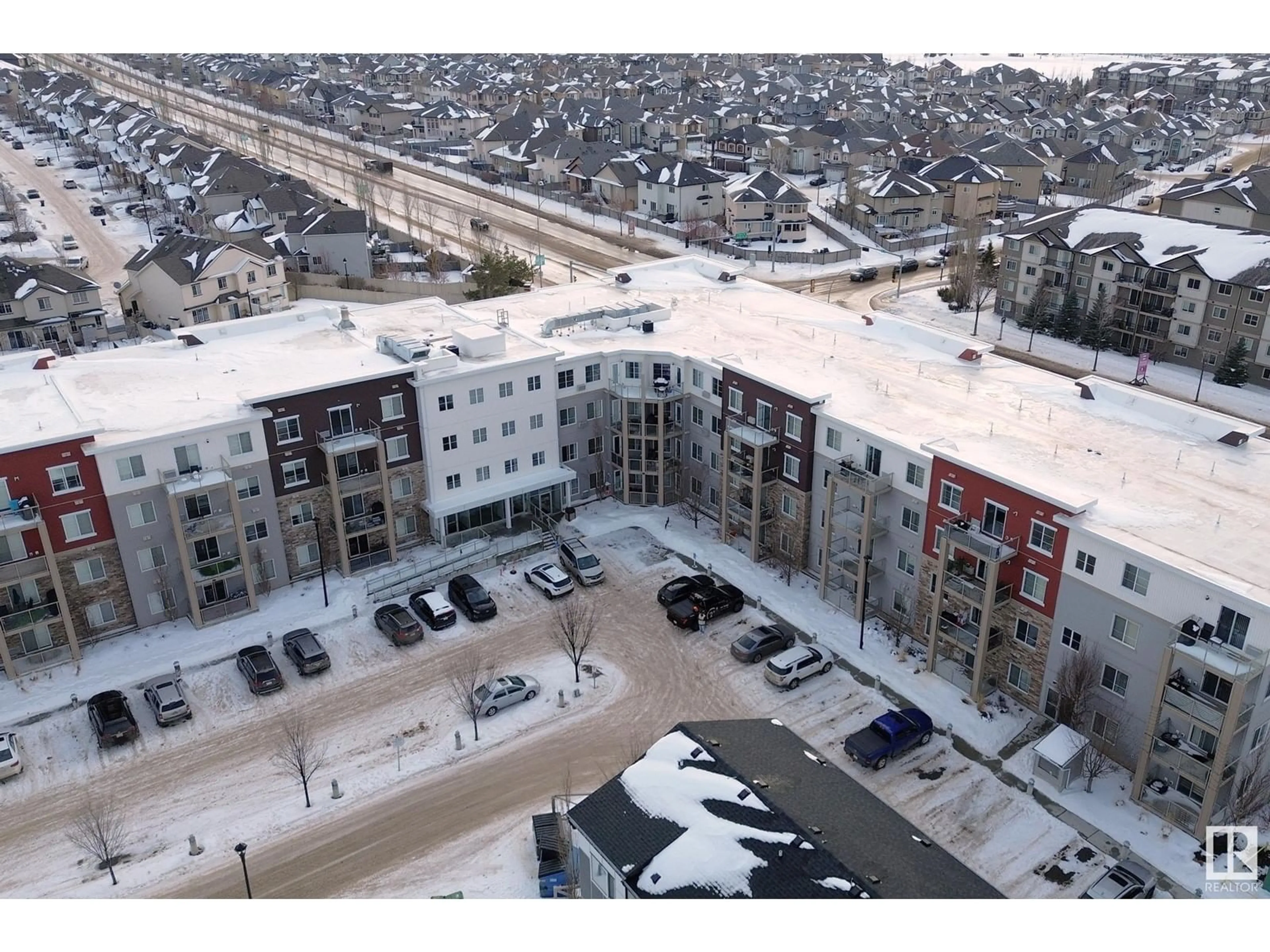 A pic from outside/outdoor area/front of a property/back of a property/a pic from drone, city buildings view from balcony for #103 812 WELSH DR SW SW, Edmonton Alberta T6X1Y7