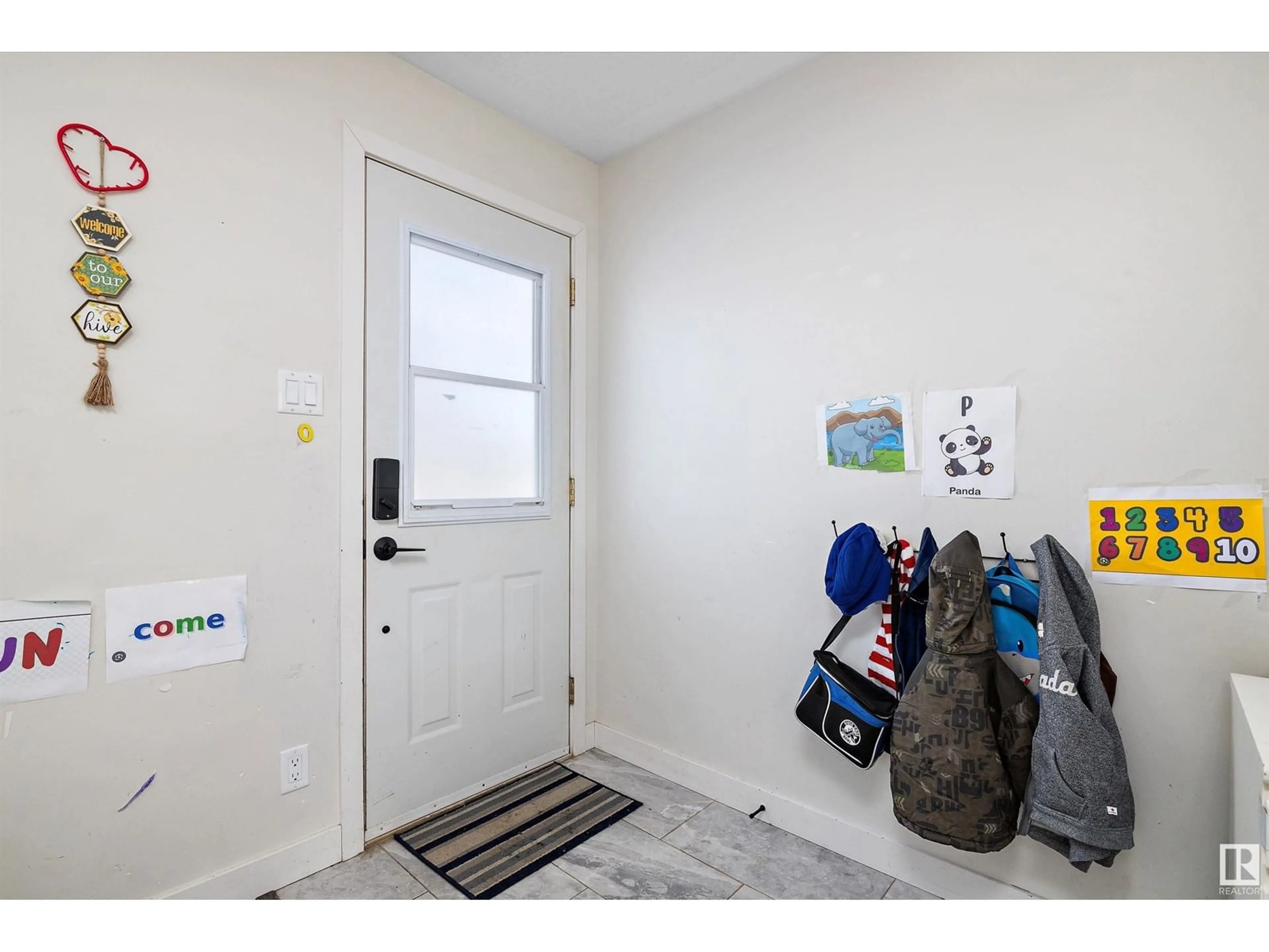 Indoor entryway for 9315 129B AV NW, Edmonton Alberta T5E0P6