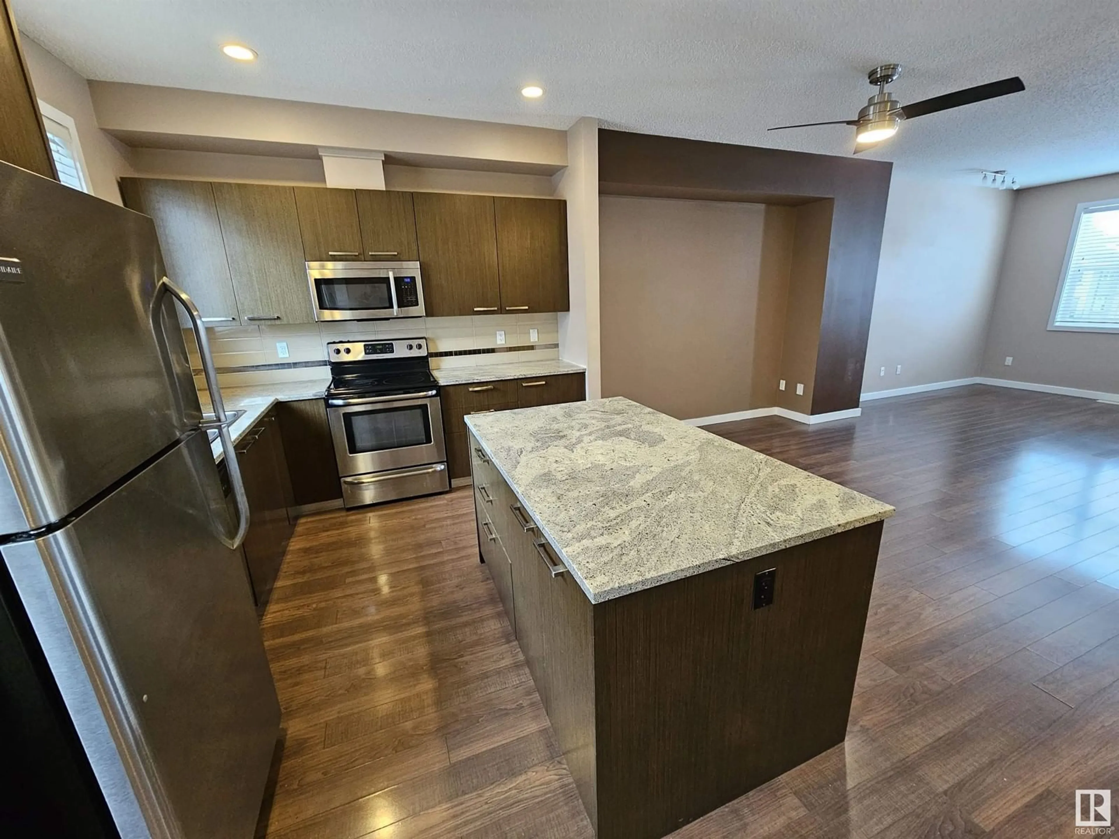 Open concept kitchen, unknown for 655 - 56 WATT BV, Edmonton Alberta T6X0Y2