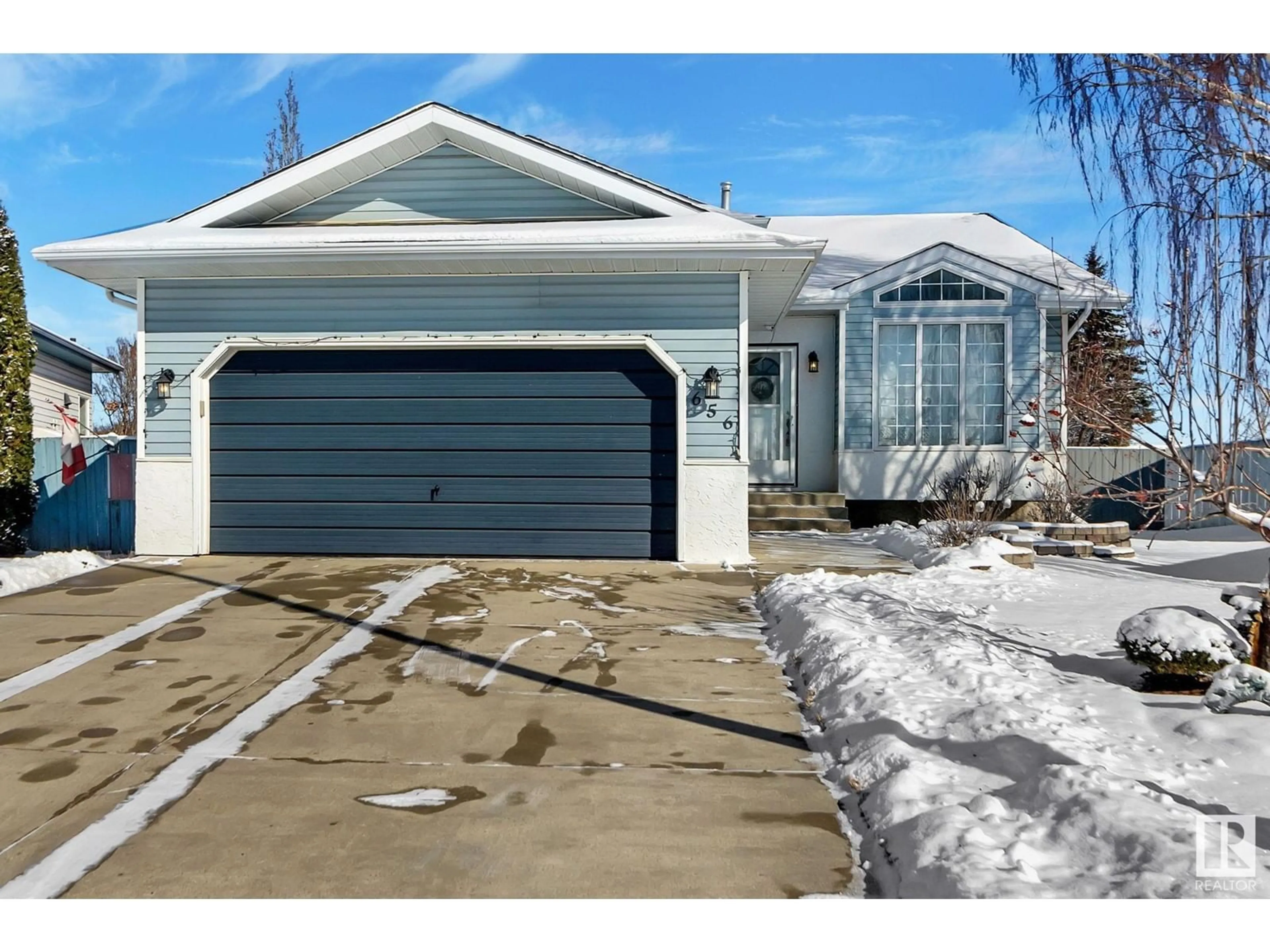 Home with vinyl exterior material, street for 656 JENNER COVE CV NW, Edmonton Alberta T6L6S1