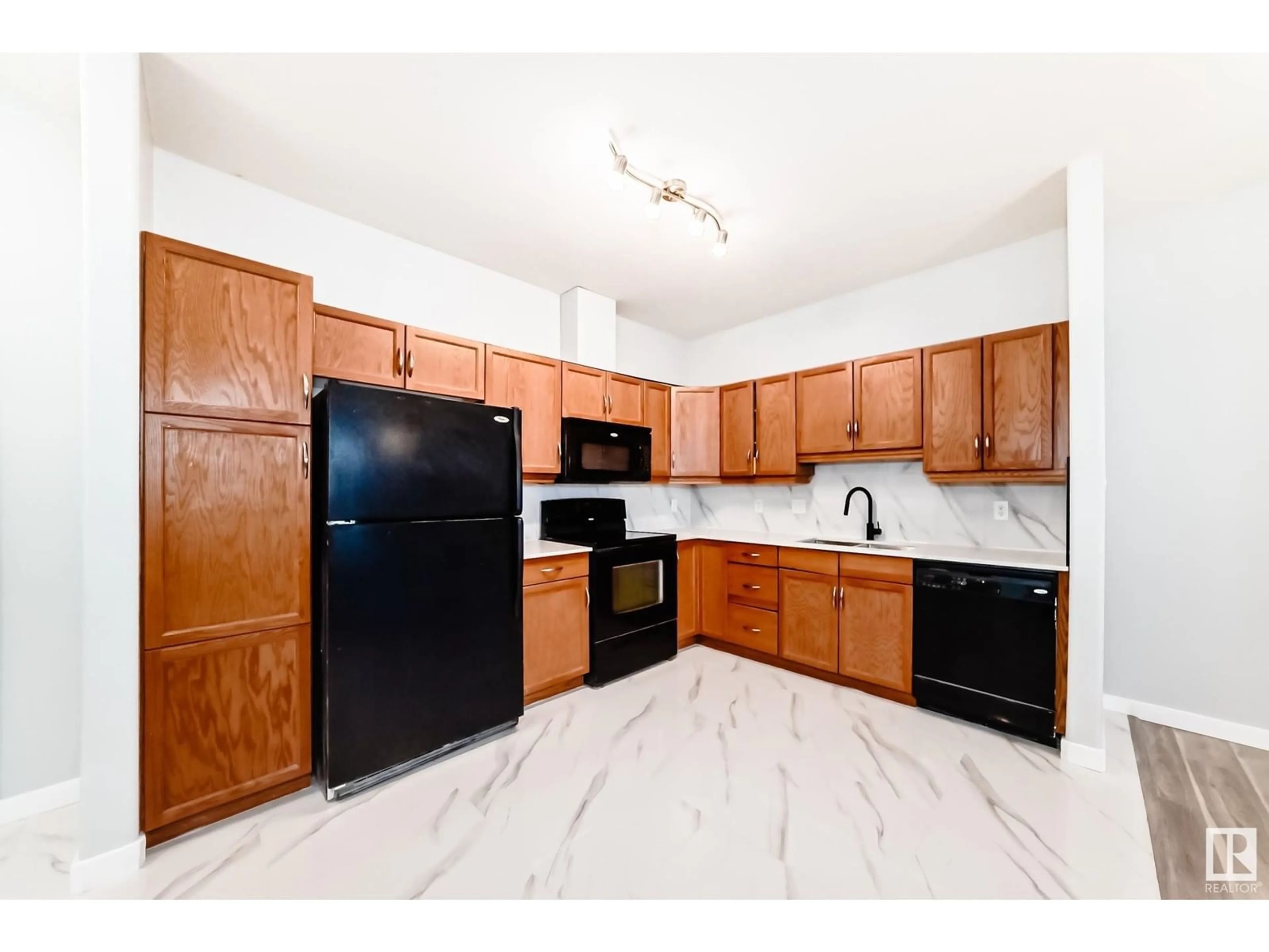 Standard kitchen, ceramic/tile floor for #123 2503 HANNA CR NW, Edmonton Alberta T6R0H1