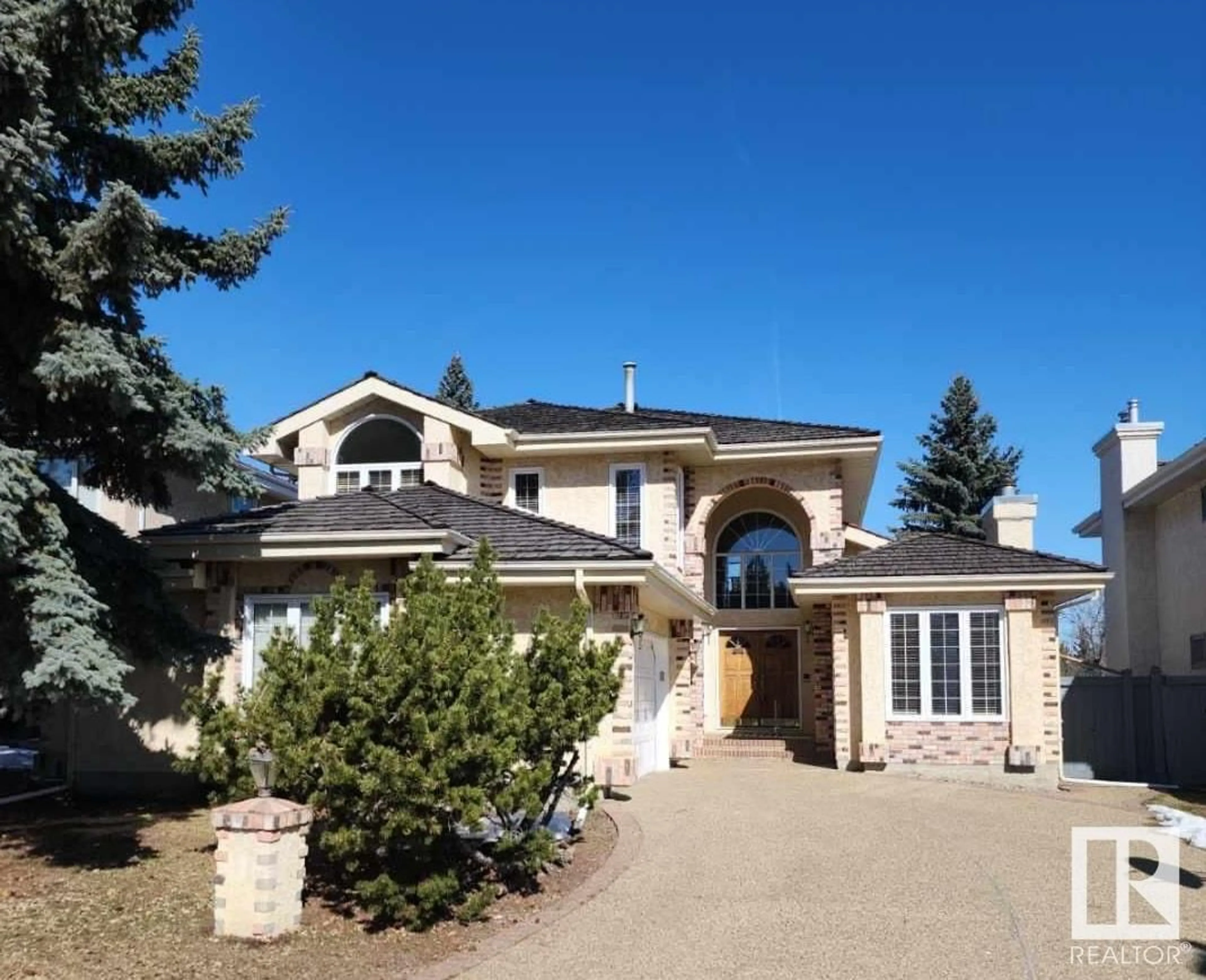 Home with vinyl exterior material, street for 956 OGILVIE BV, Edmonton Alberta T6R1K8