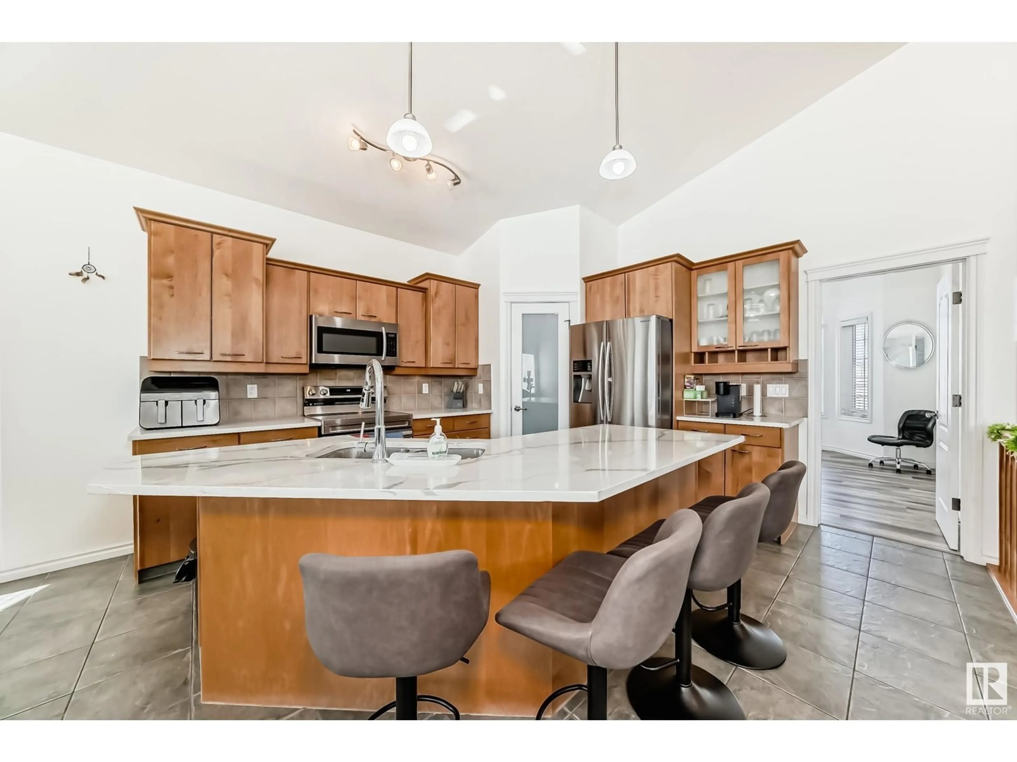 Open concept kitchen, ceramic/tile floor for 16606 75A ST NW, Edmonton Alberta T5Z3W2