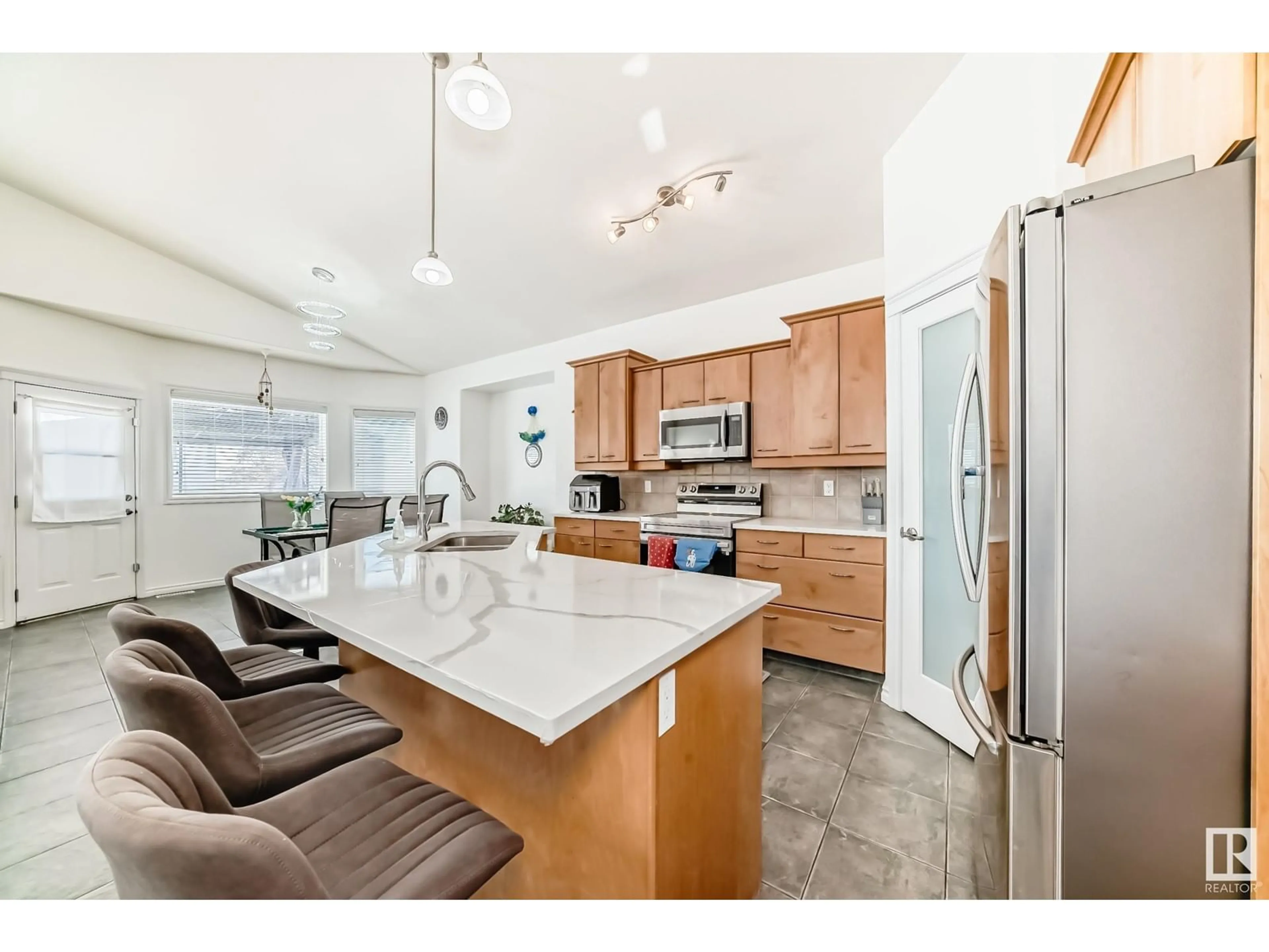 Open concept kitchen, ceramic/tile floor for 16606 75A ST NW, Edmonton Alberta T5Z3W2