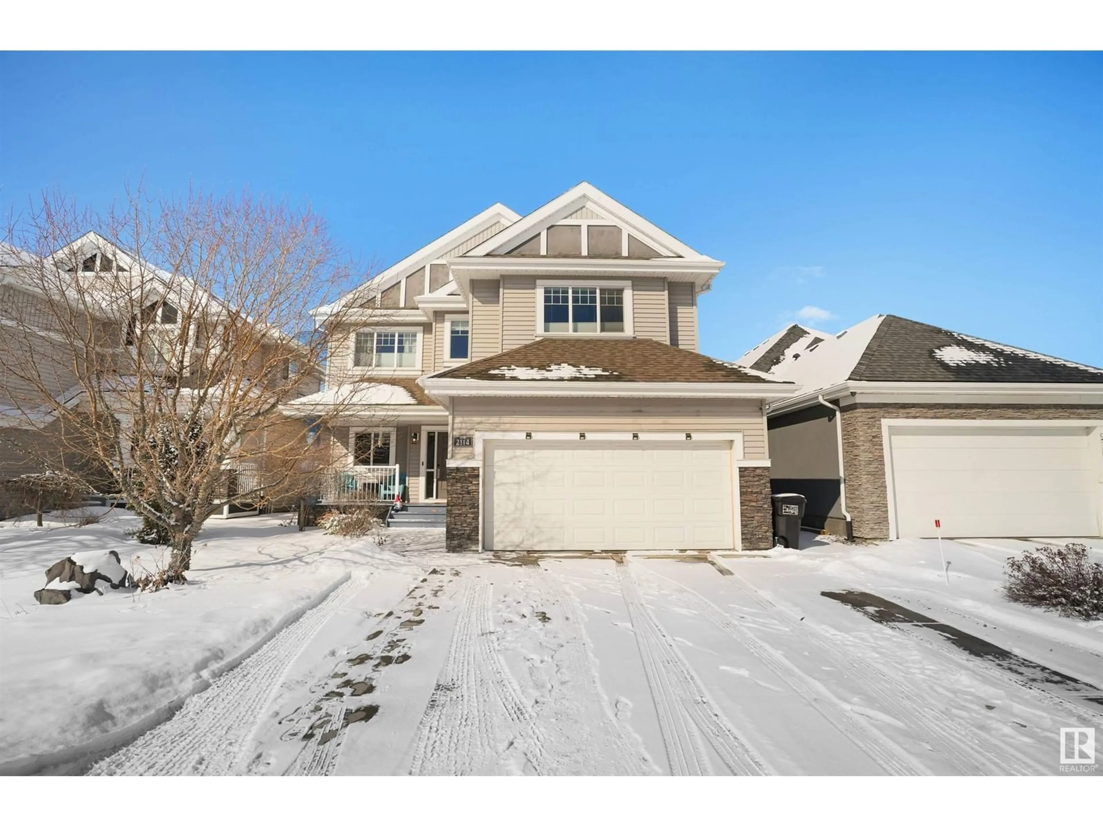 Home with vinyl exterior material, street for SW - 2114 89B ST, Edmonton Alberta T6X0R9