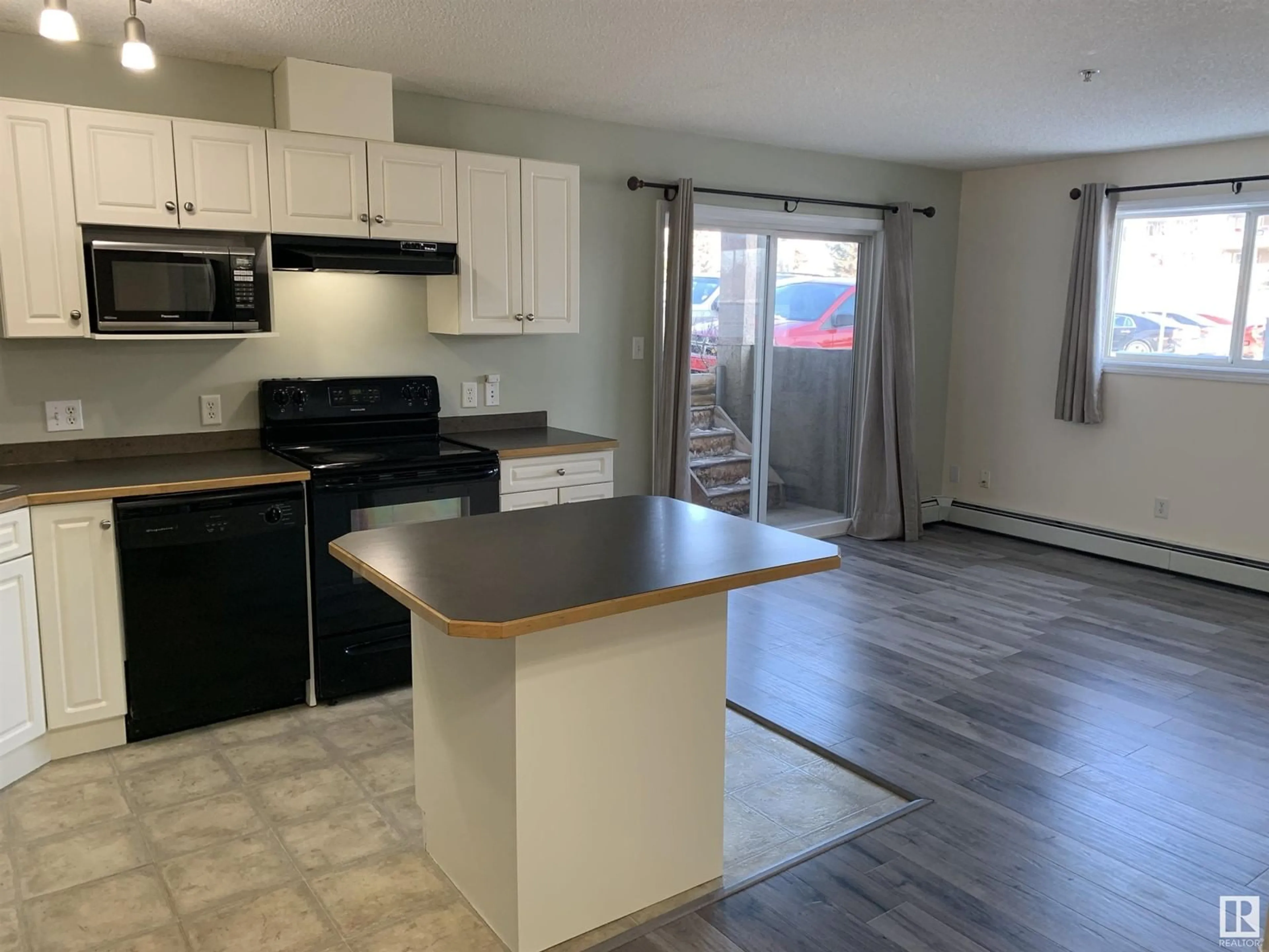 Open concept kitchen, unknown for NW - 135 11325 83 ST, Edmonton Alberta T5B4W5