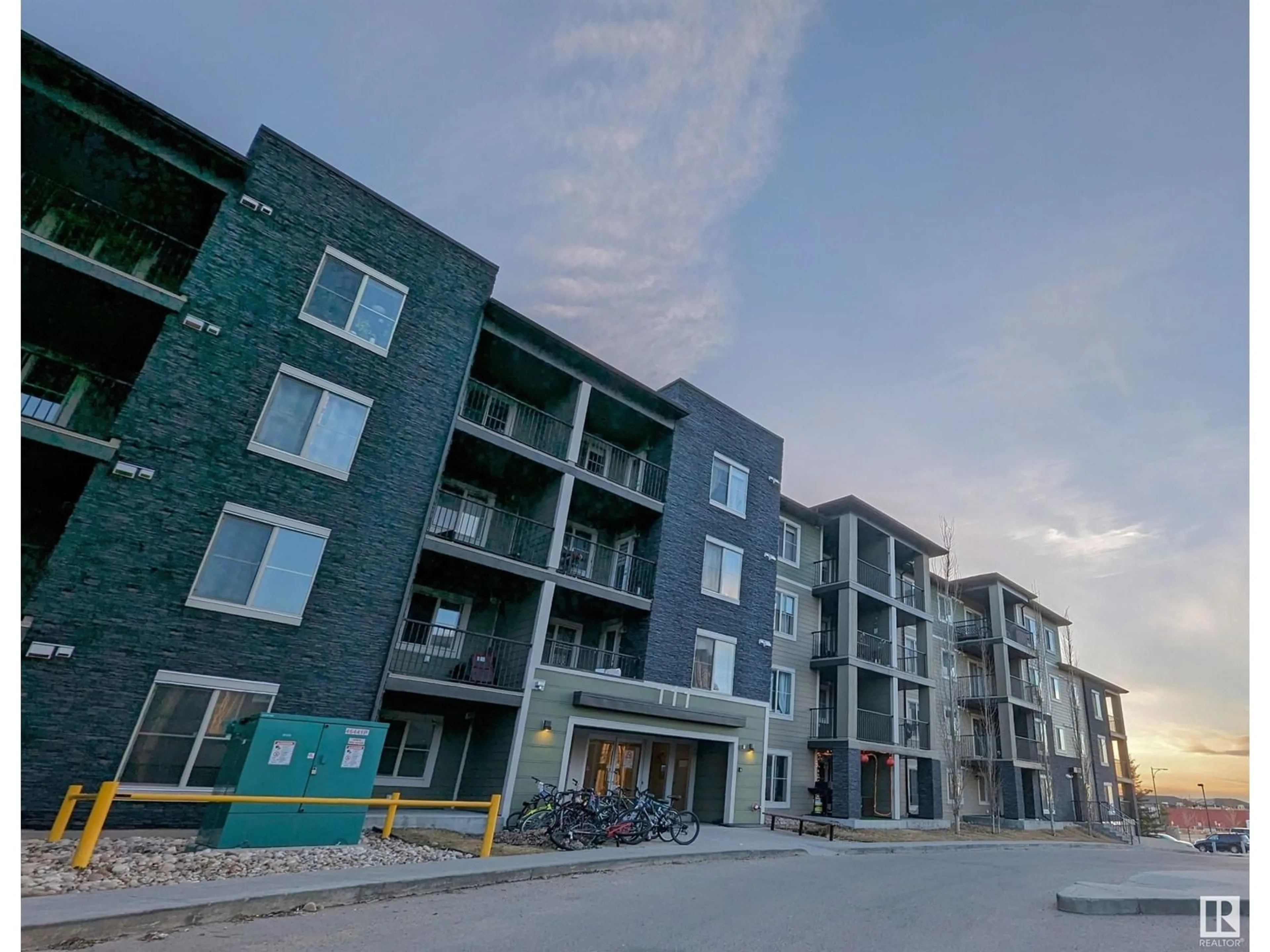 A pic from outside/outdoor area/front of a property/back of a property/a pic from drone, building for #108 - 111 WATT CM, Edmonton Alberta T6X2C6