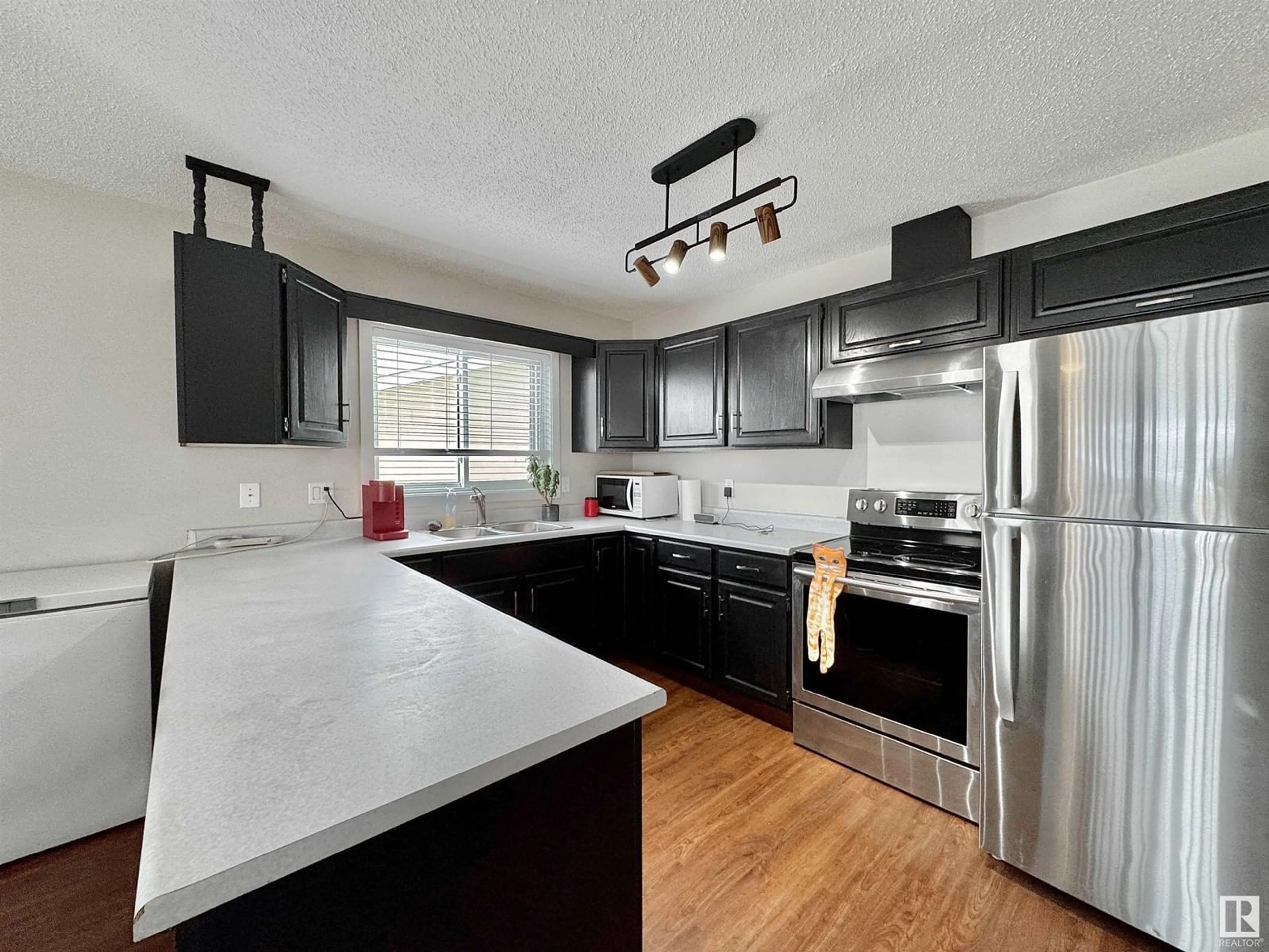 Open concept kitchen, unknown for NW - 14723 35 ST, Edmonton Alberta T5Y2H8