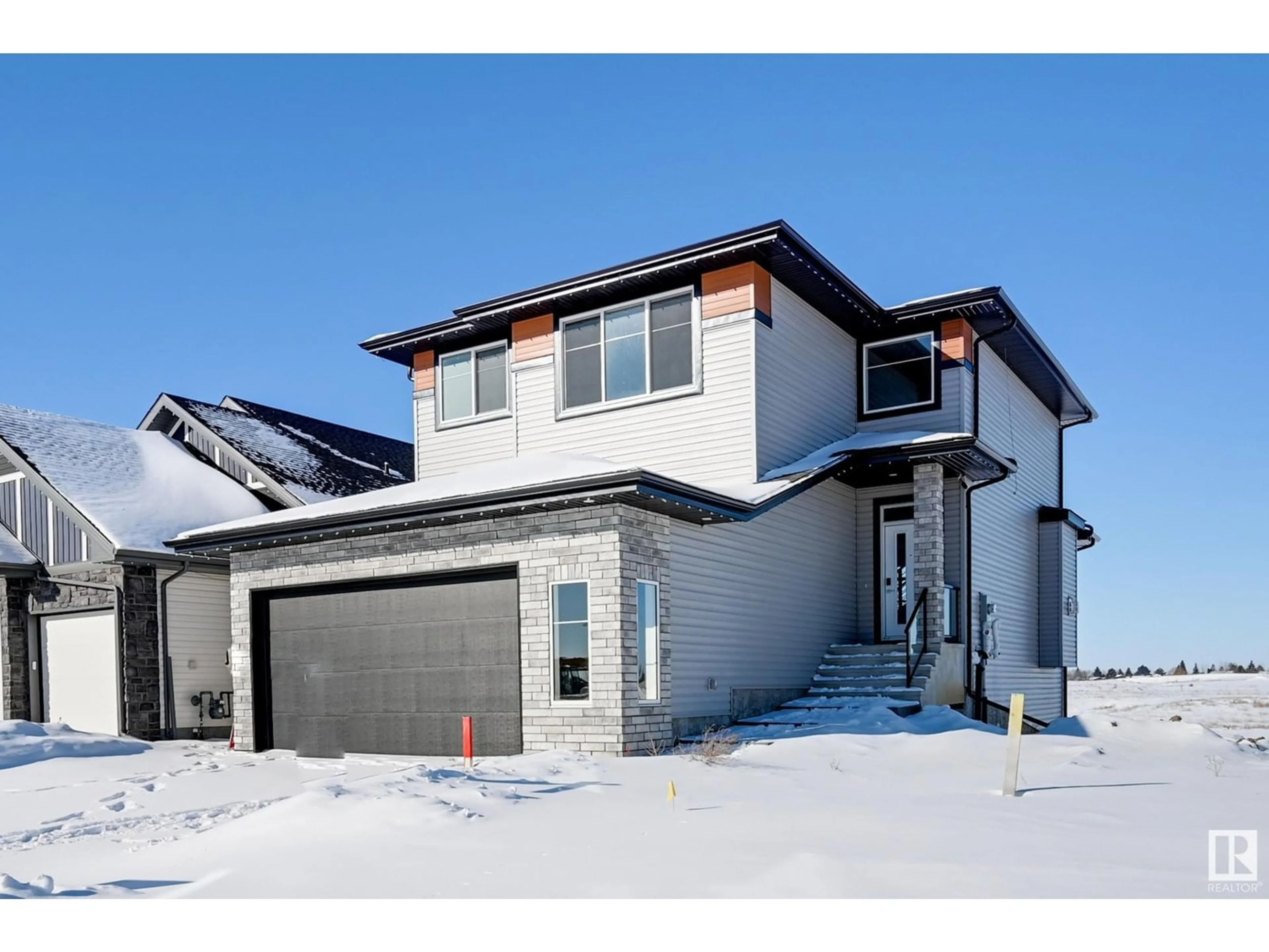 Home with brick exterior material, street for 10214 92A AV, Morinville Alberta T8R2R4