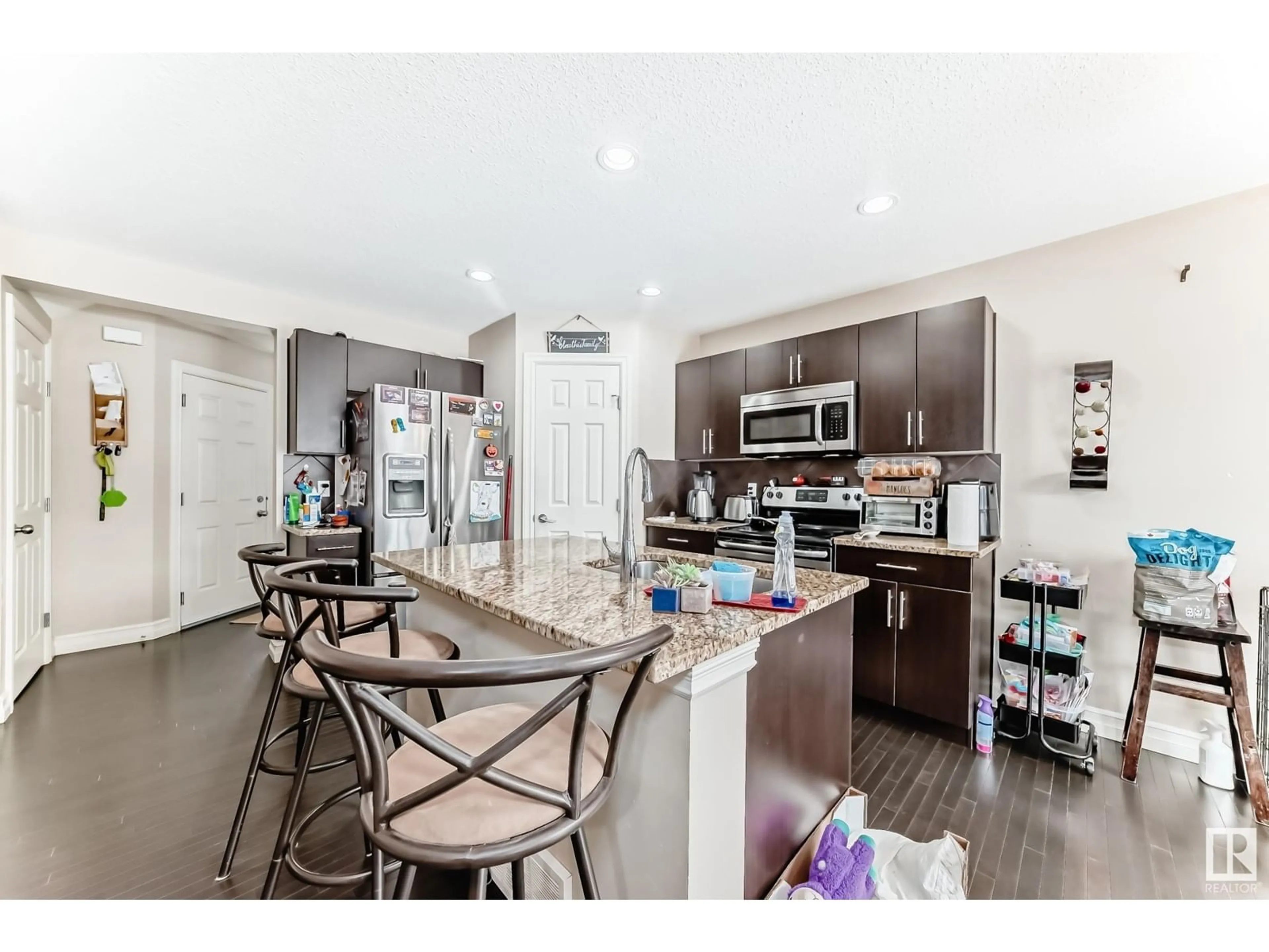 Open concept kitchen, unknown for NW - 3939 6 ST, Edmonton Alberta T6T0T5