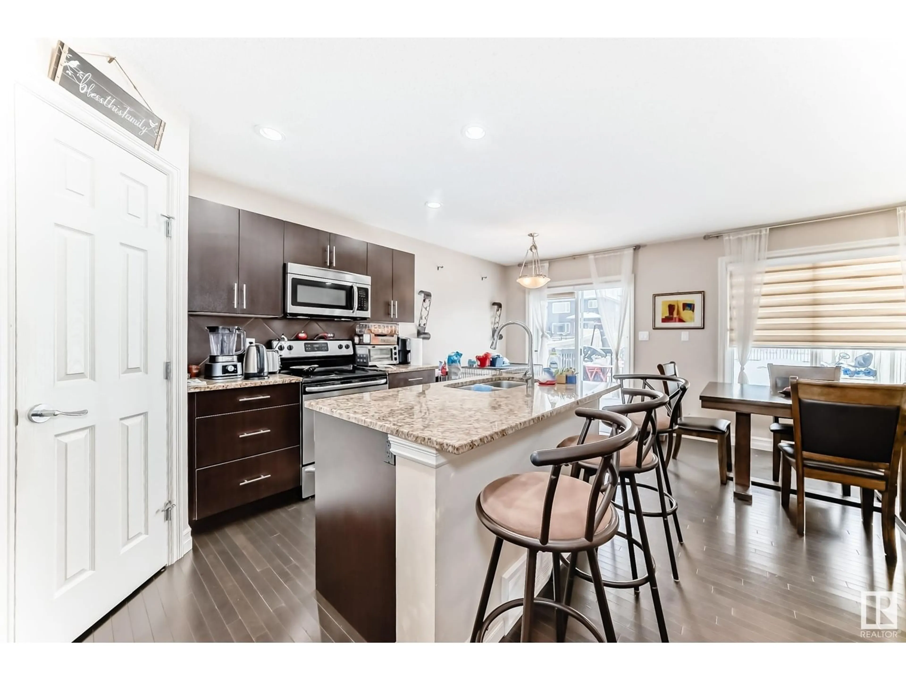 Open concept kitchen, unknown for NW - 3939 6 ST, Edmonton Alberta T6T0T5