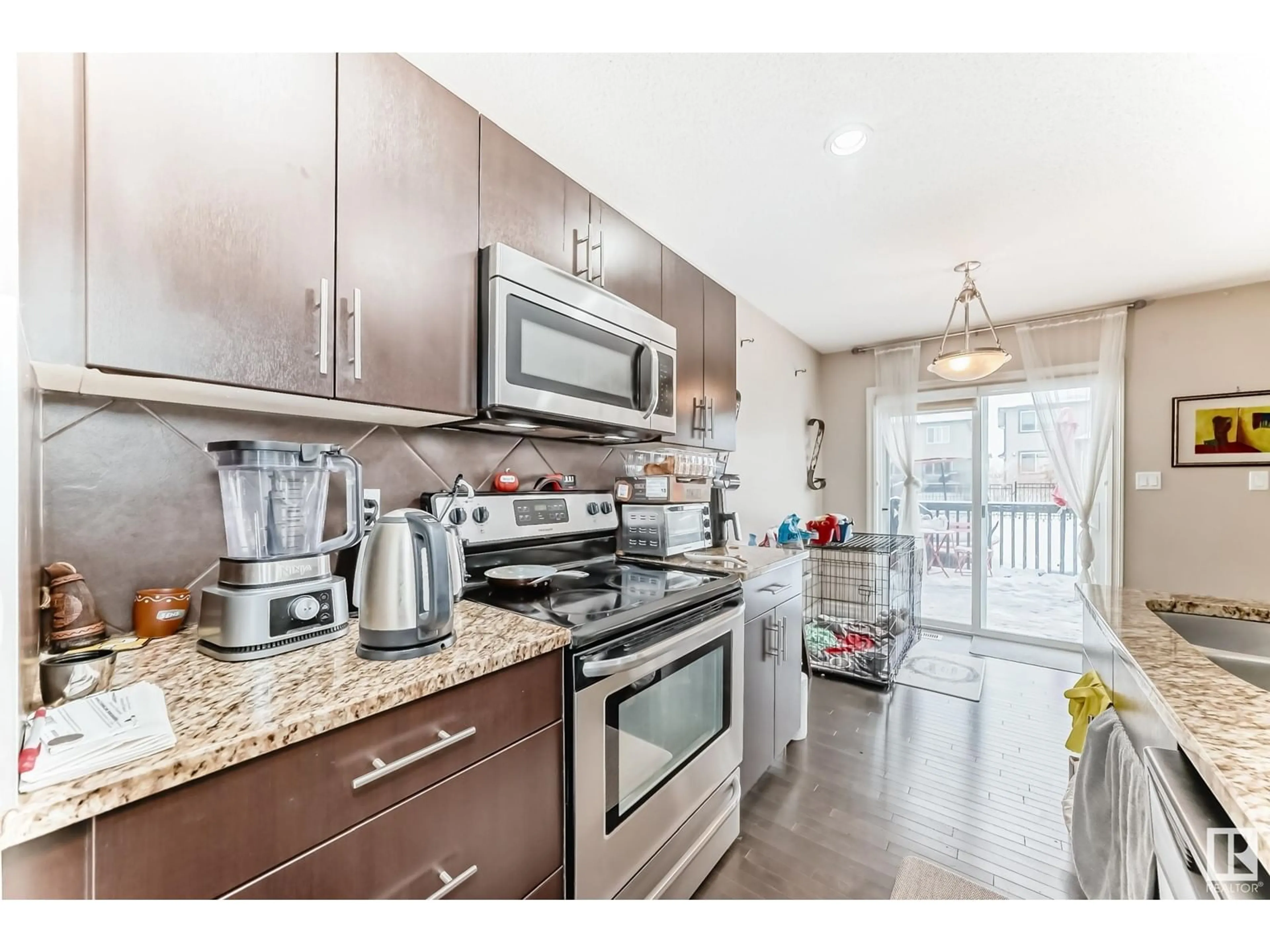 Open concept kitchen, unknown for NW - 3939 6 ST, Edmonton Alberta T6T0T5