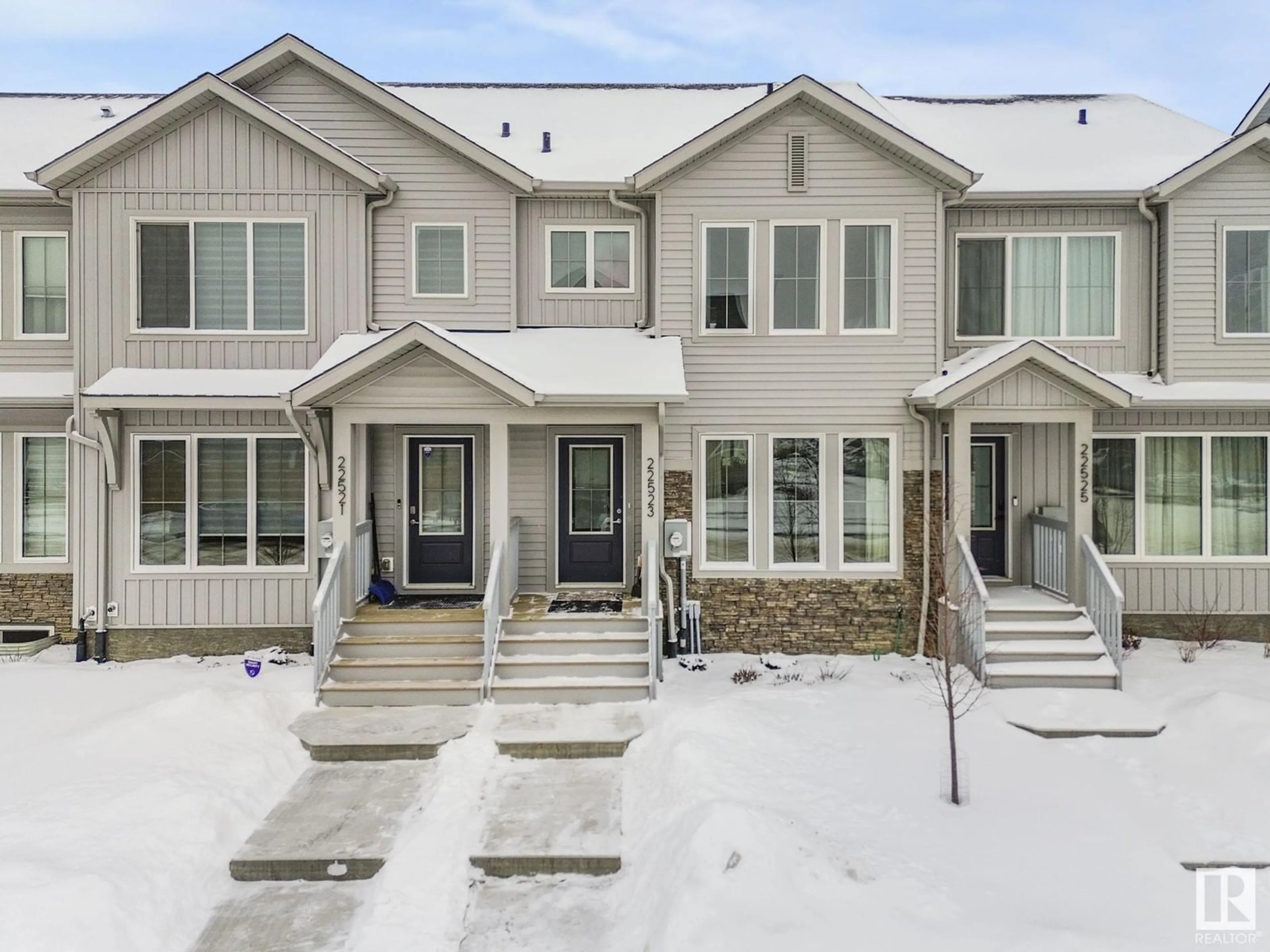 Home with vinyl exterior material, street for 22523 93 AV, Edmonton Alberta T5T7K2
