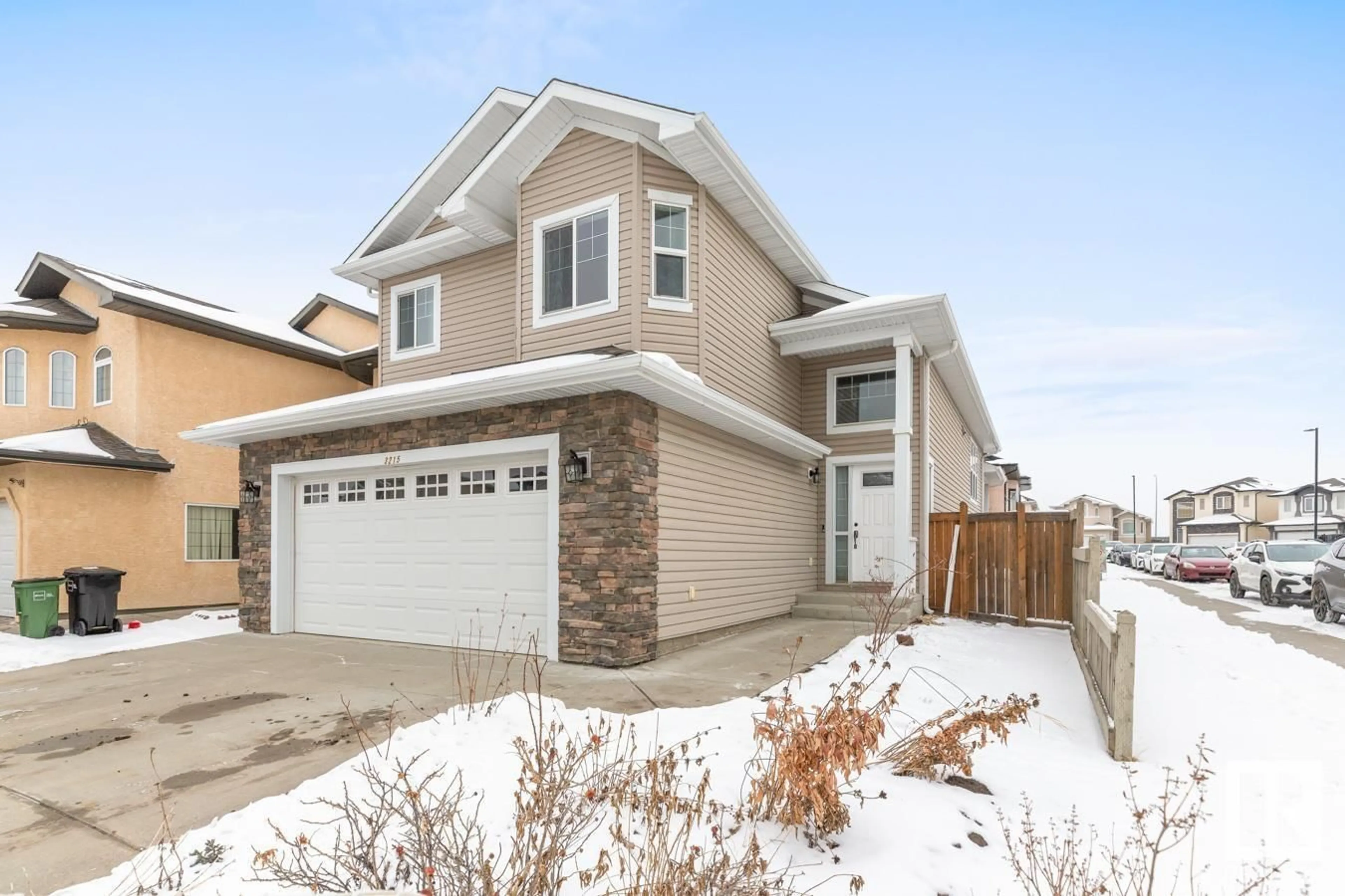 Home with vinyl exterior material, street for NW - 3215 20 ST, Edmonton Alberta T6T0H3