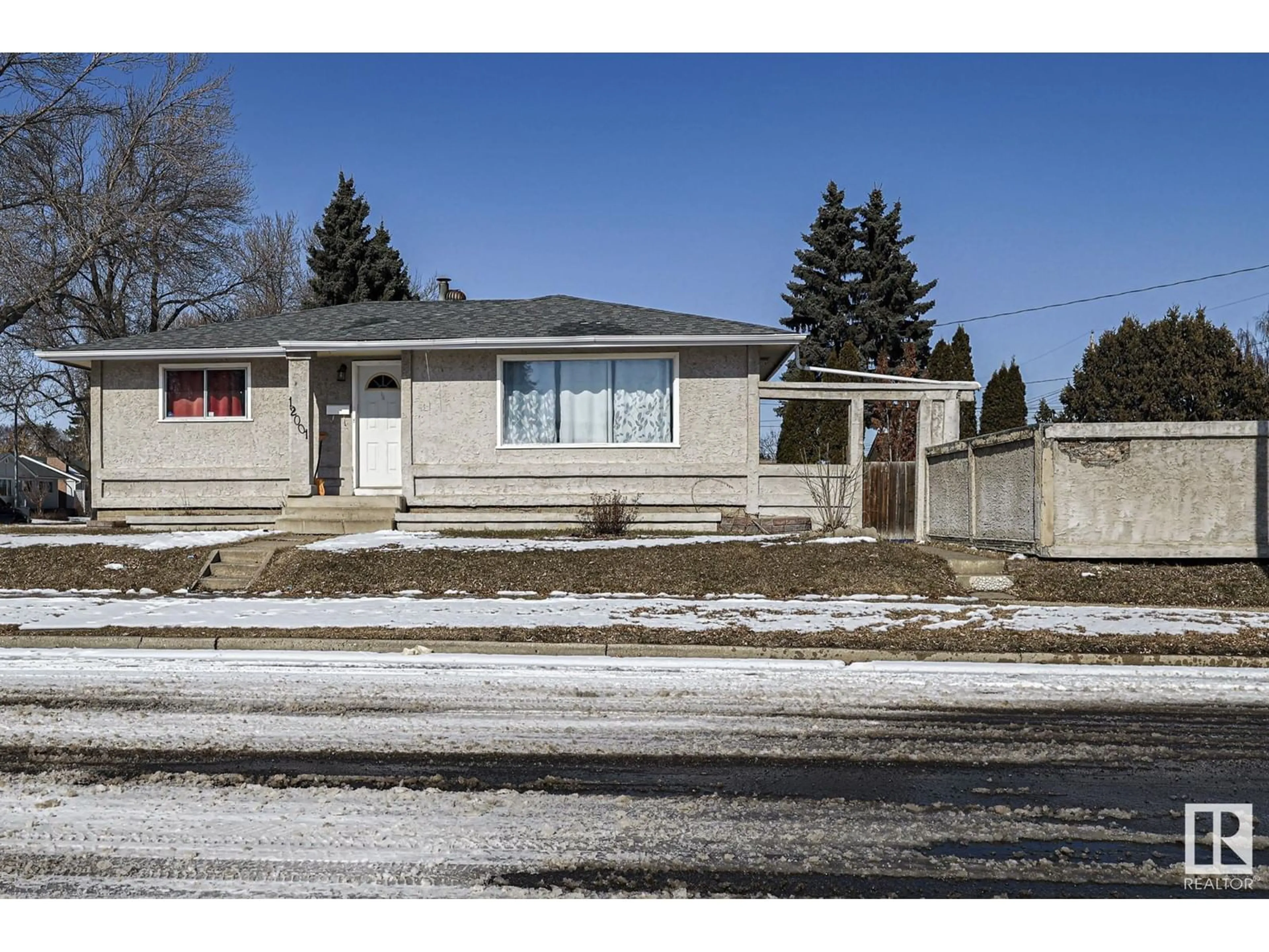 Home with vinyl exterior material, street for NW - 12001 37 ST, Edmonton Alberta T5W2C2