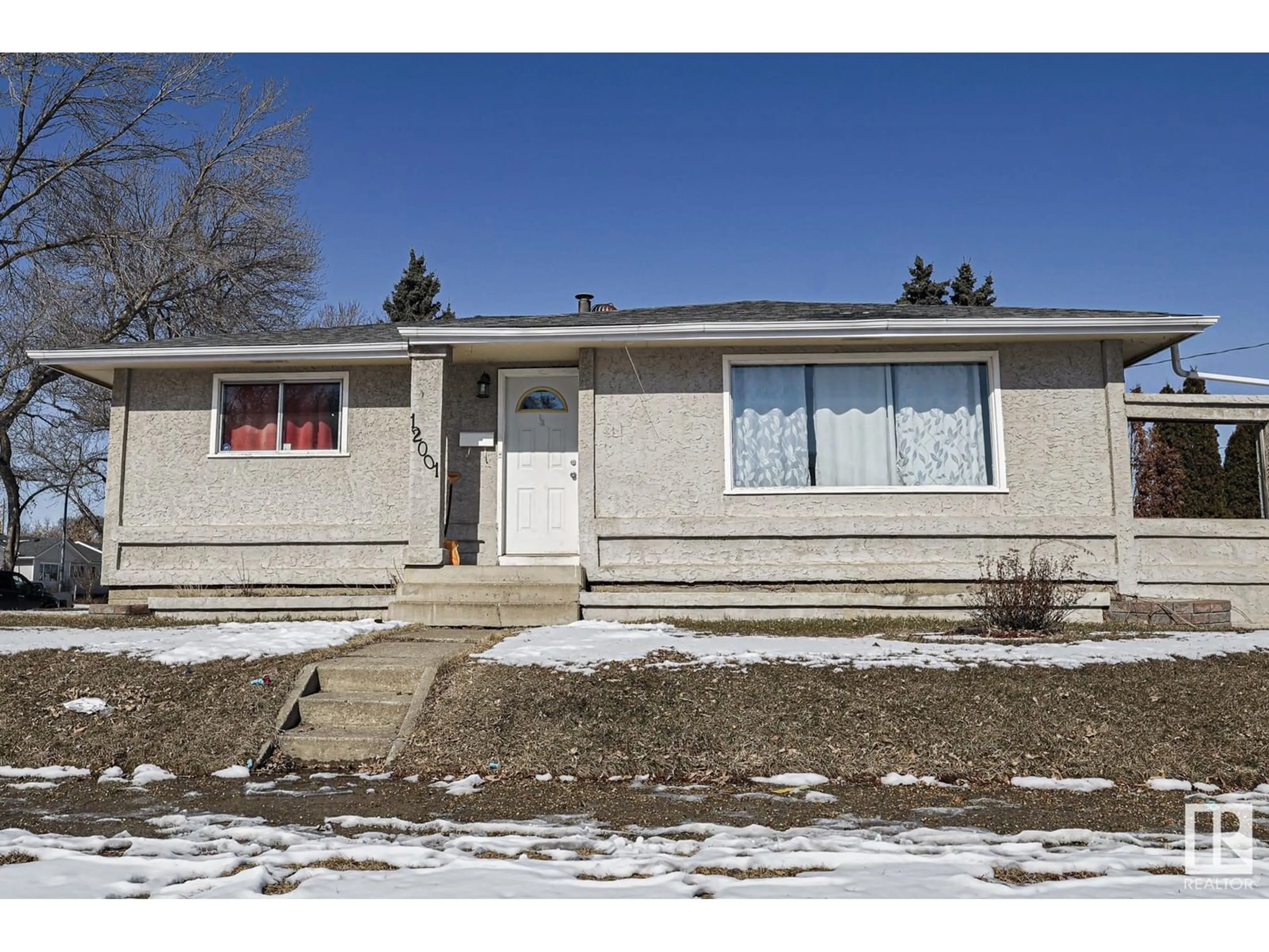 Home with vinyl exterior material, street for NW - 12001 37 ST, Edmonton Alberta T5W2C2