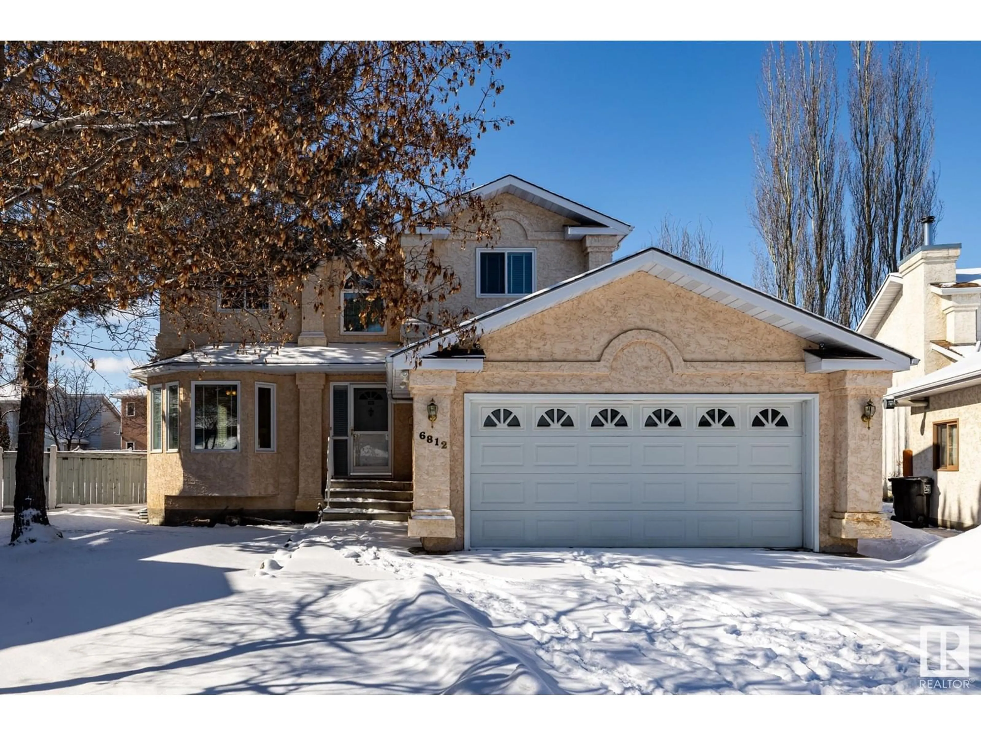 Home with vinyl exterior material, street for NW - 6812 188 ST, Edmonton Alberta T5T4X3