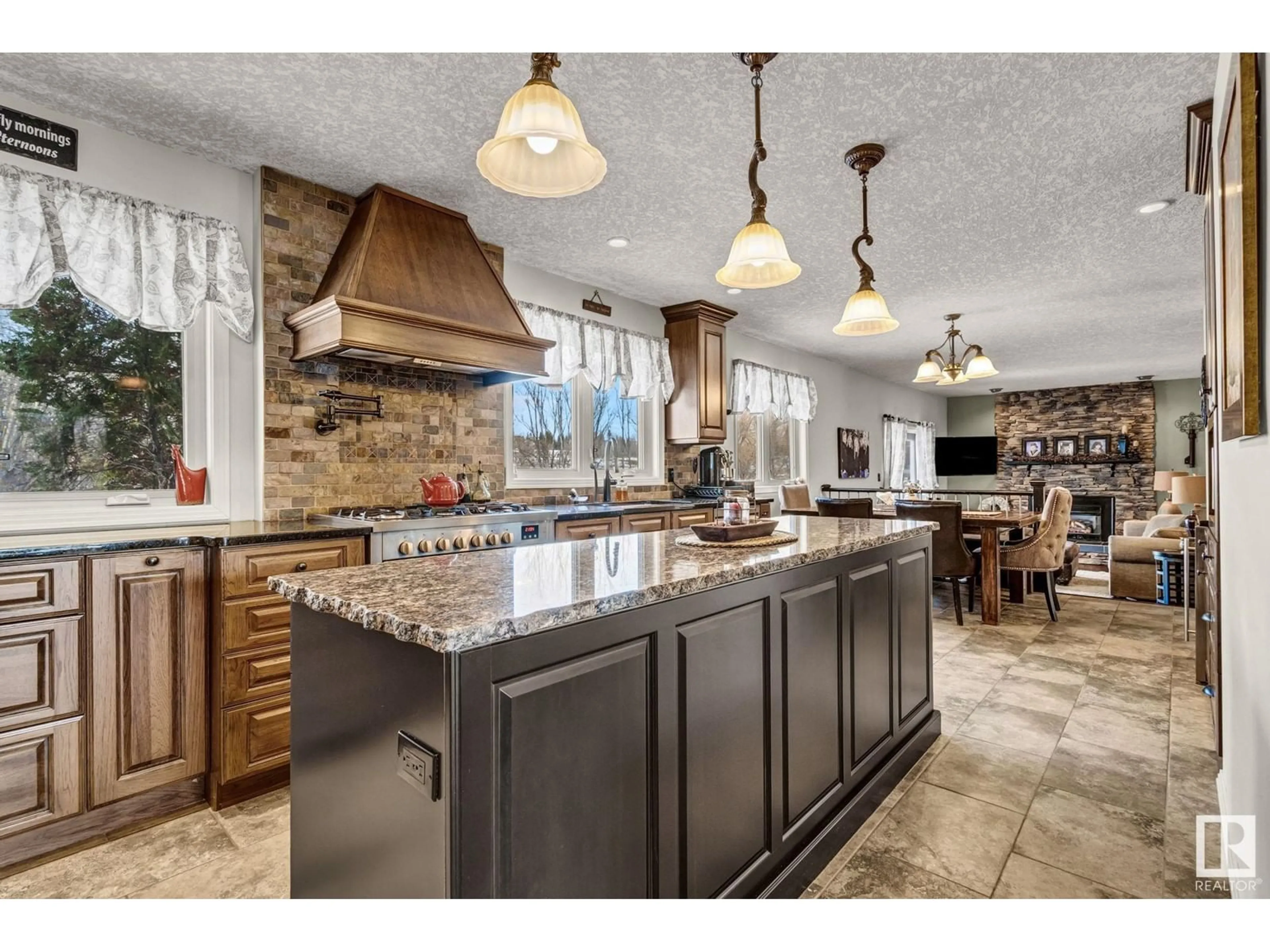 Open concept kitchen, ceramic/tile floor for 14 - 54006 RGE RD 274, Rural Parkland County Alberta T7X3S8