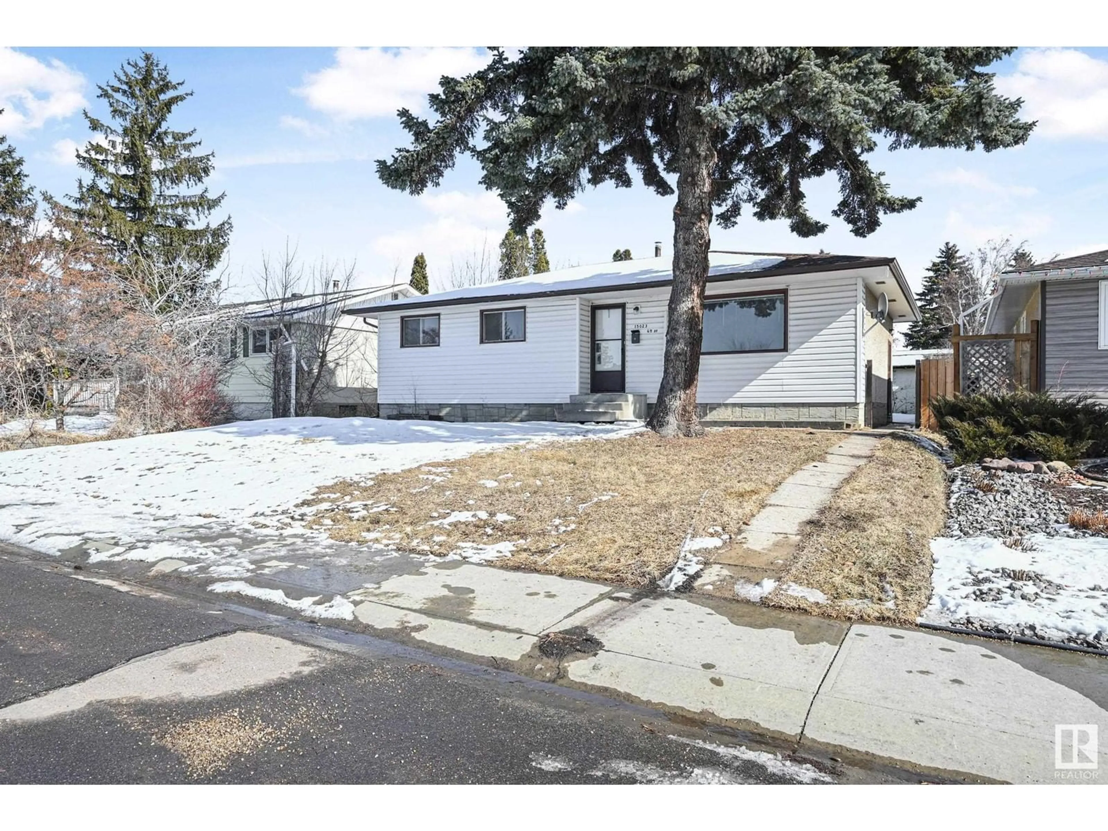 Home with vinyl exterior material, street for 15023 69 ST NW, Edmonton Alberta T5C0J3