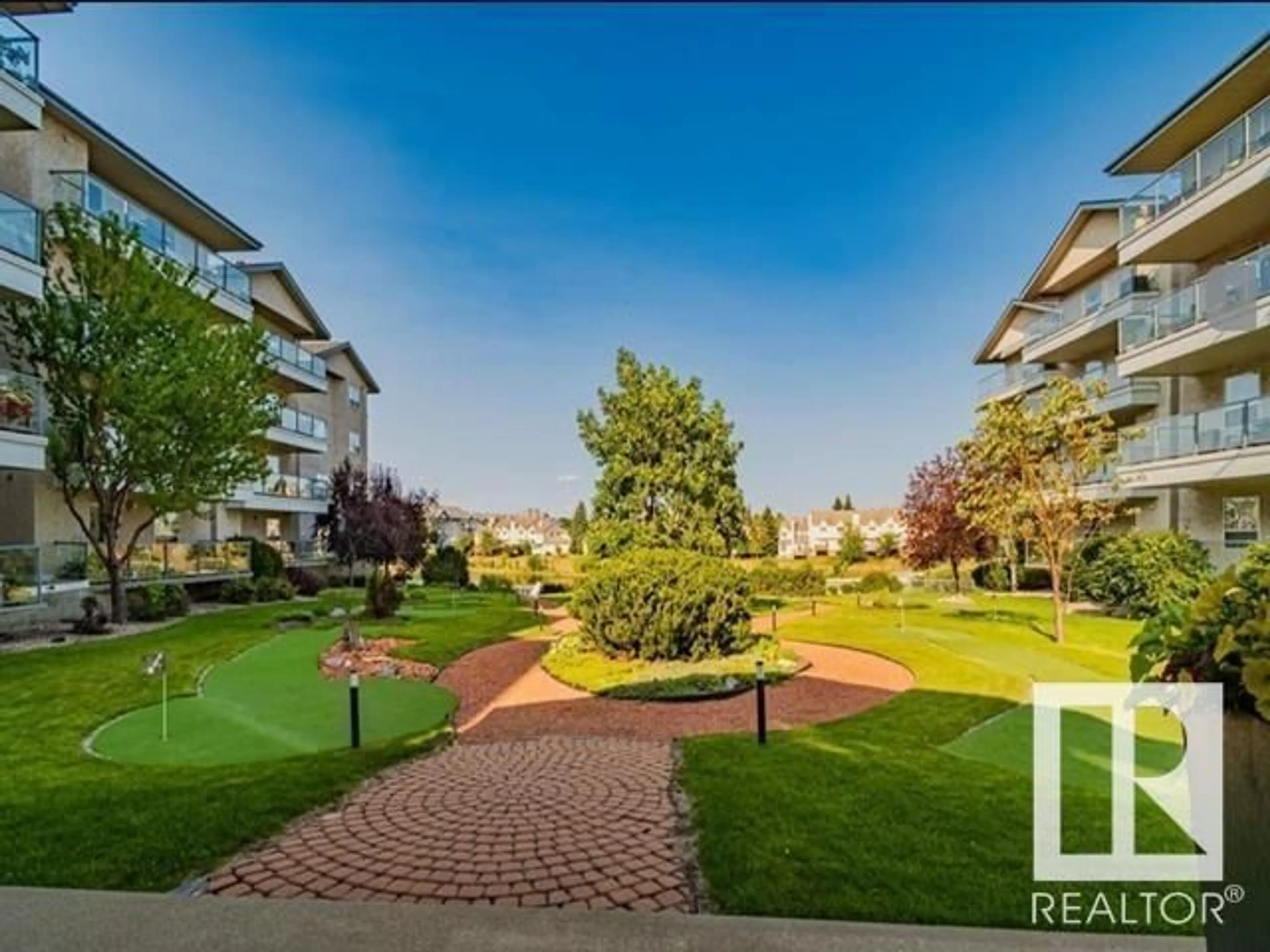 A pic from outside/outdoor area/front of a property/back of a property/a pic from drone, water/lake/river/ocean view for #111 - 9535 176 ST, Edmonton Alberta T5T6C8