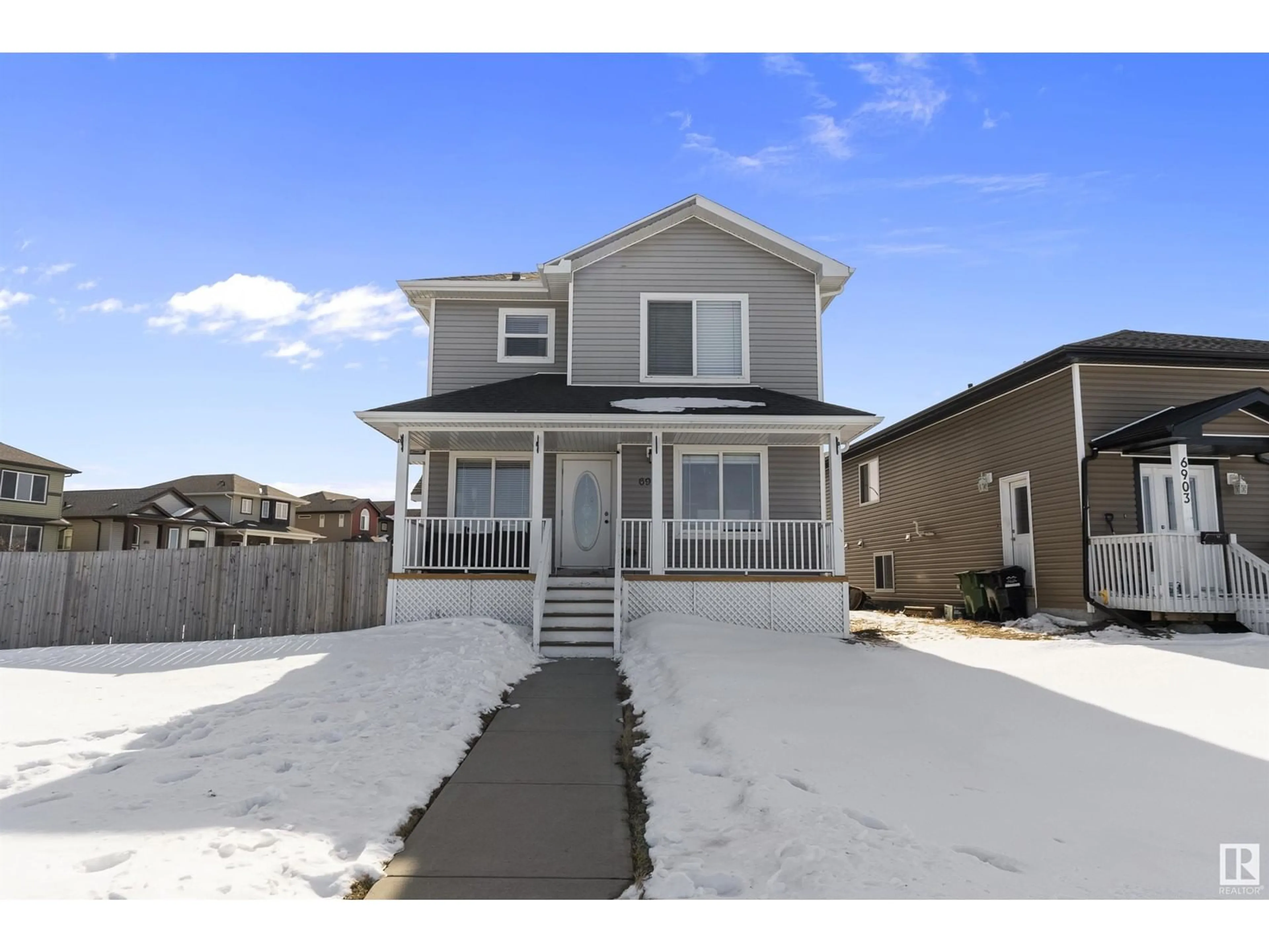 Home with vinyl exterior material, street for 6901 50 AVE, Camrose Alberta T4V5C6